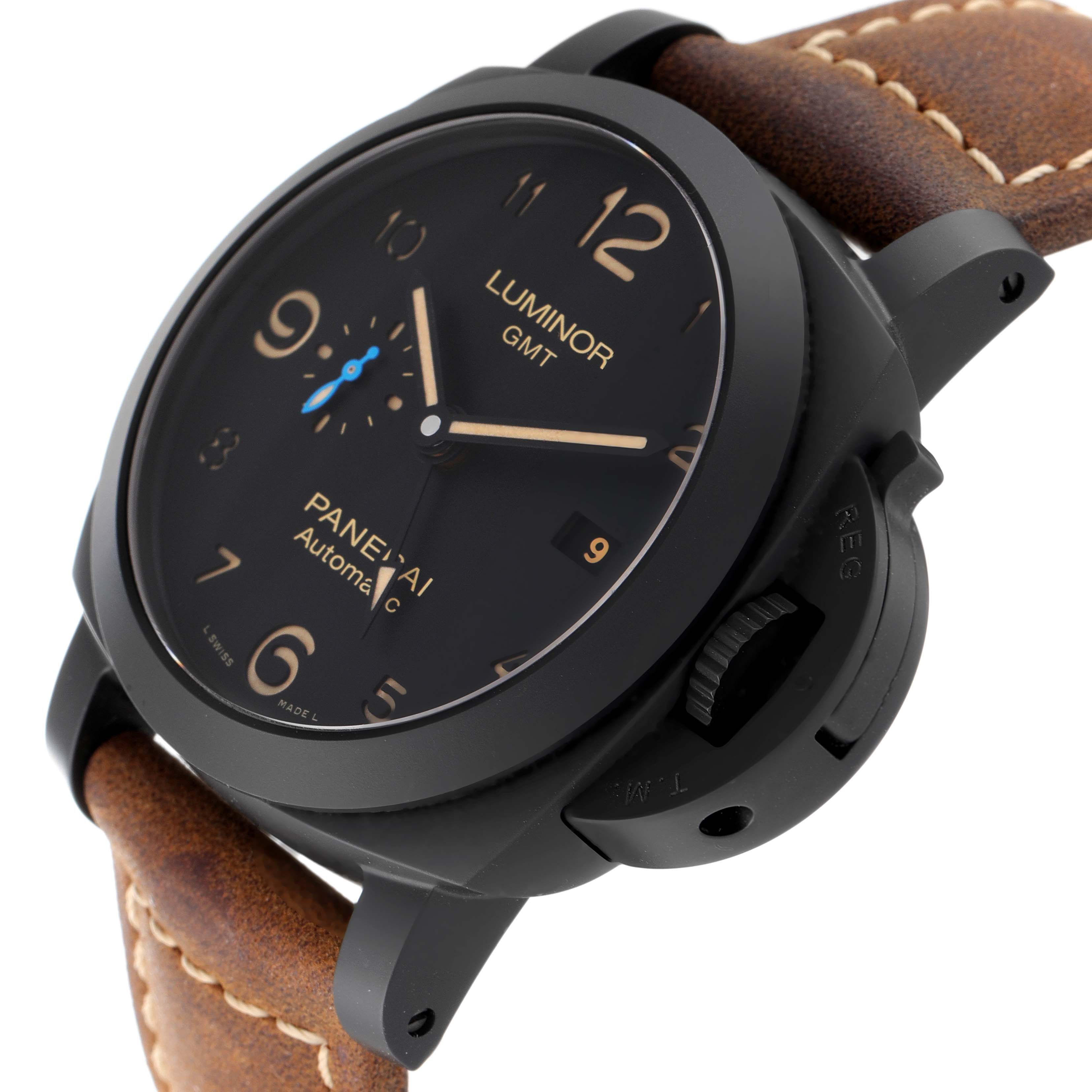The image shows a close-up, angled view of the Luminor model watch by Panerai, highlighting the dial, crown, and leather strap.