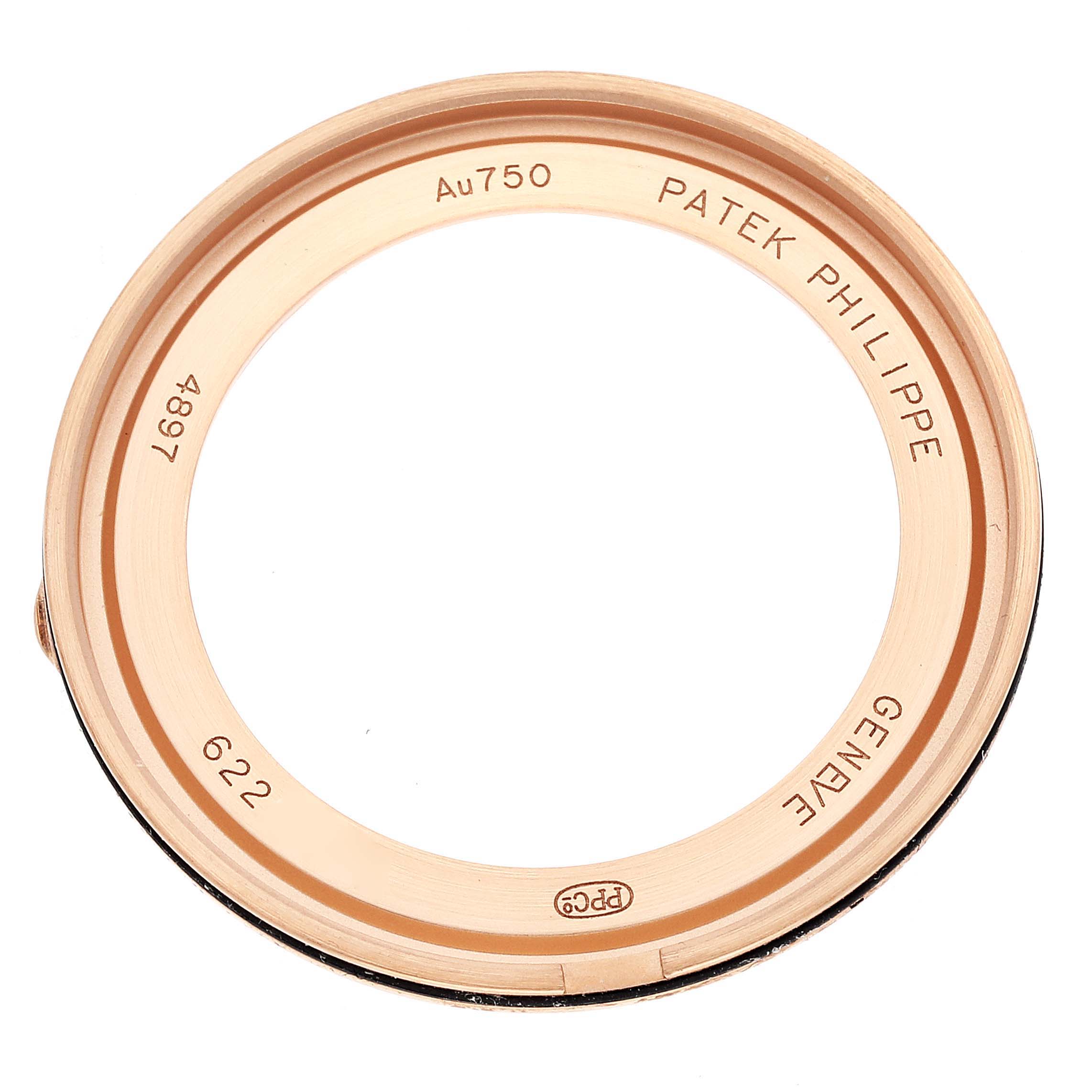This image shows a close-up of the casing bezel for a Patek Philippe Calatrava 4897R-001 Women's Rose Gold Brown Dial 4897R-001 Women's Rose Gold Brown Dial watch.