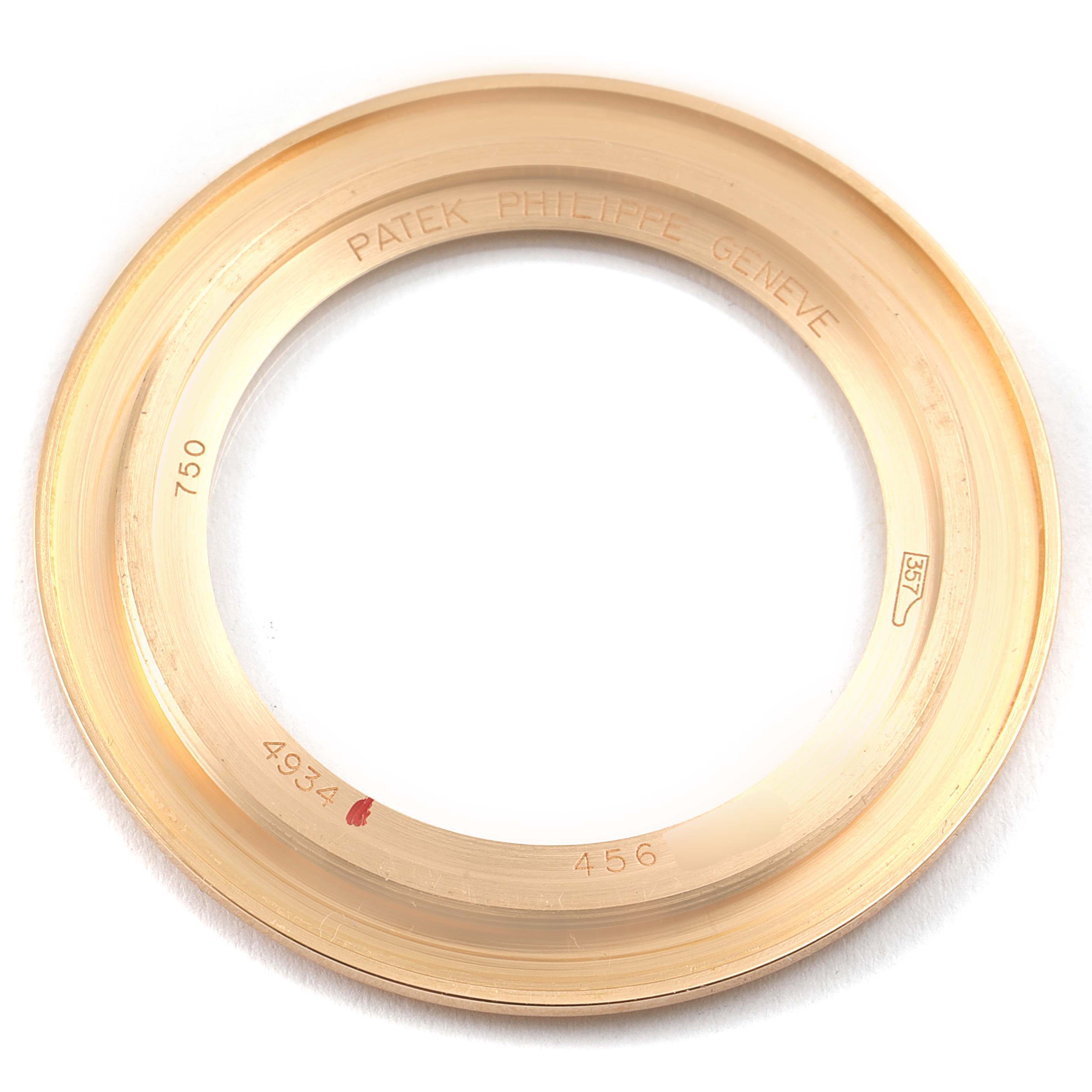 This image shows the bezel of a Patek Philippe Calatrava 4934R Women's Rose Gold Mother of Pearl Dial 4934R Women's Rose Gold Mother of Pearl Dial watch from a top-down angle.