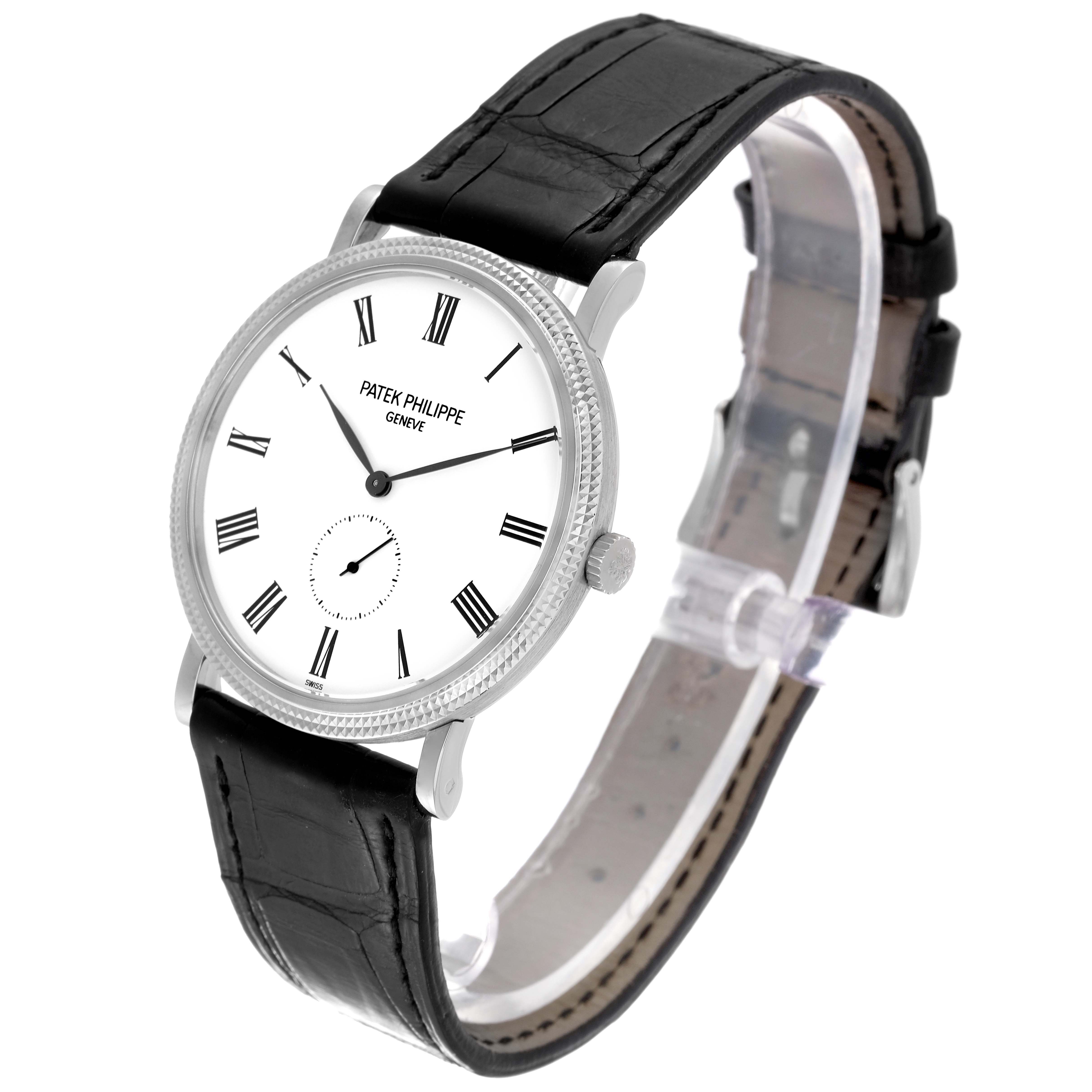The image shows a side angle of the Patek Philippe Calatrava 5119G-001 Men
s White Gold White Dial 5119G-001 Men
s White Gold White Dial watch, highlighting the face, case, crown, and leather strap.