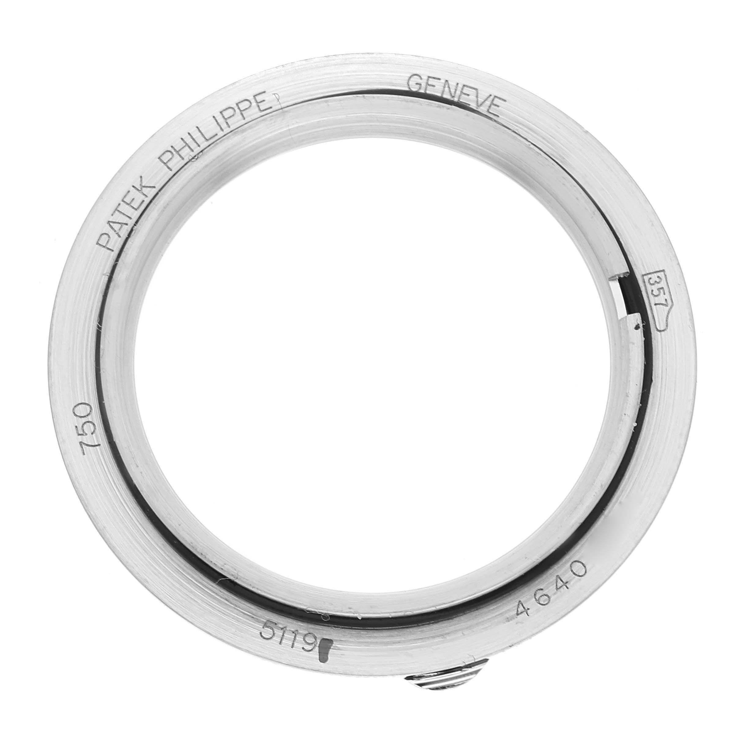 This image shows the bezel of a Patek Philippe Calatrava 5119G-001 Men
s White Gold White Dial 5119G-001 Men
s White Gold White Dial model, specifically viewed from a top-down angle.