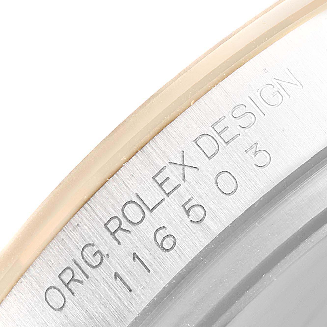 The image shows a close-up of the engraved case side of a Rolex Daytona 116503 Men
s Steel and Gold (two tone) White Dial 116503 Men
s Steel and Gold (two tone) White Dial watch, displaying the model number 116503.