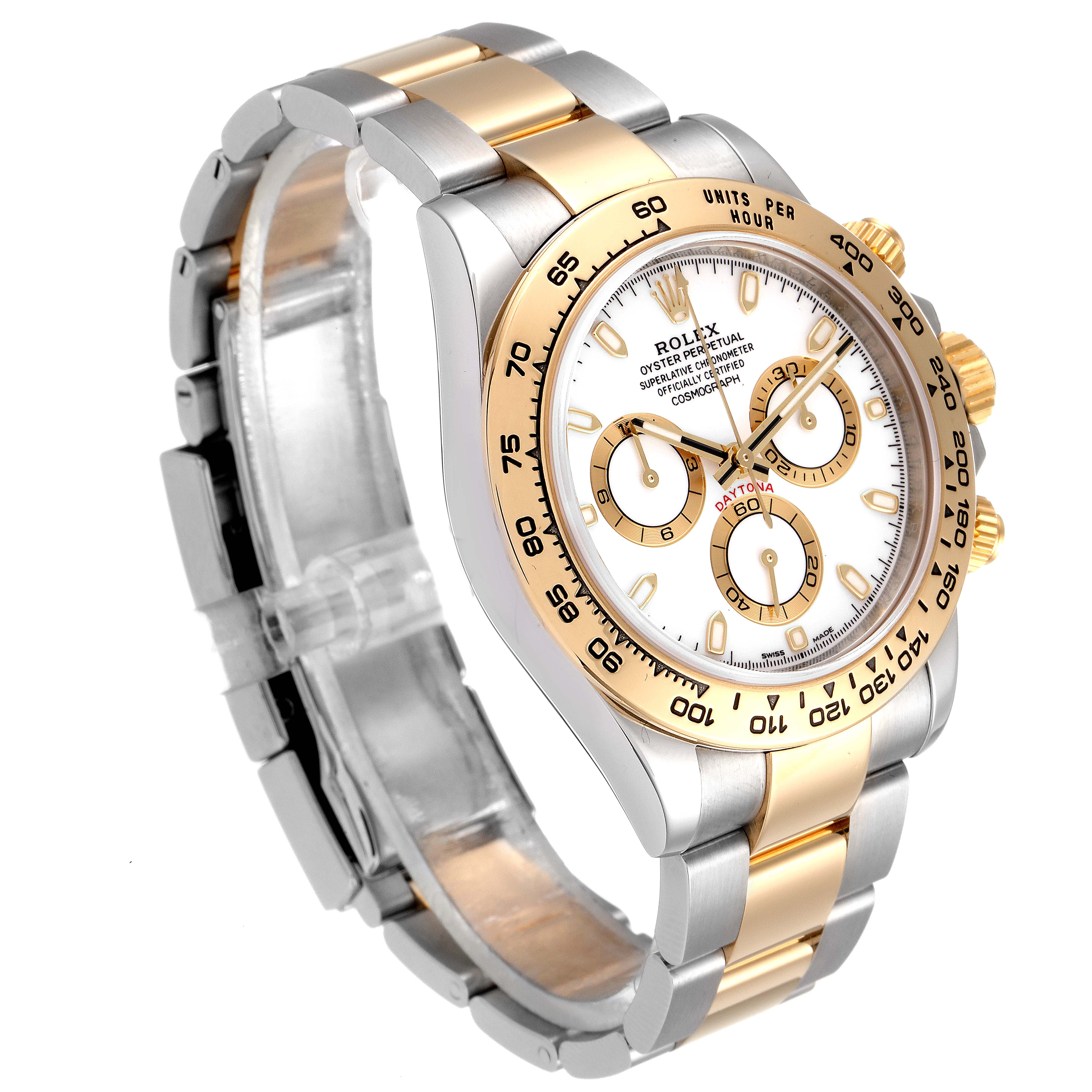 The image shows a Rolex Daytona 116503 Men
s Steel and Gold (two tone) White Dial 116503 Men
s Steel and Gold (two tone) White Dial watch at a three-quarter angle, highlighting its dial, bezel, bracelet, and push-buttons.