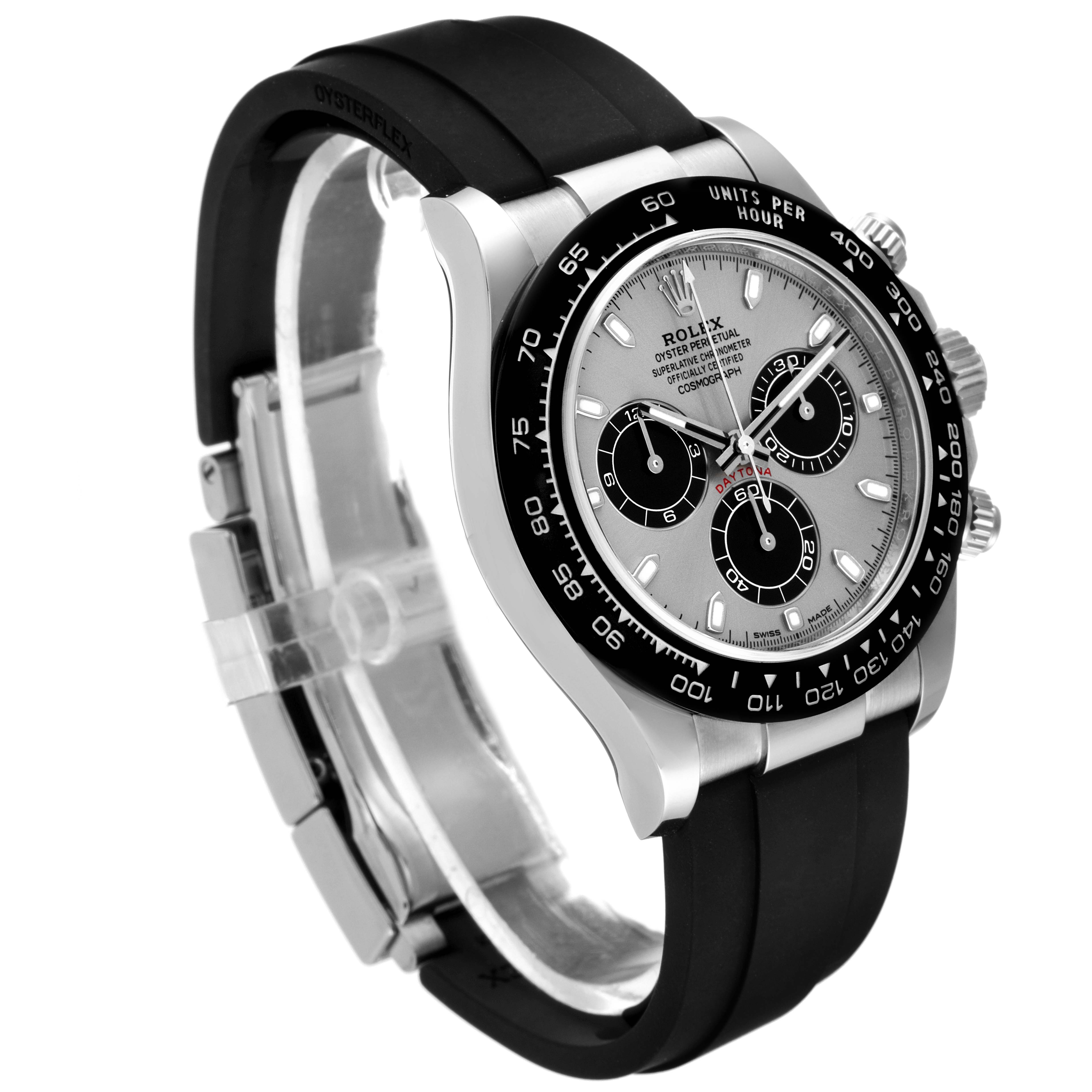 The image shows a side angle of a Rolex Daytona 116519 Men's White Gold Grey Dial 116519 Men's White Gold Grey Dial watch, highlighting its face, bezel, pushers, and rubber strap.