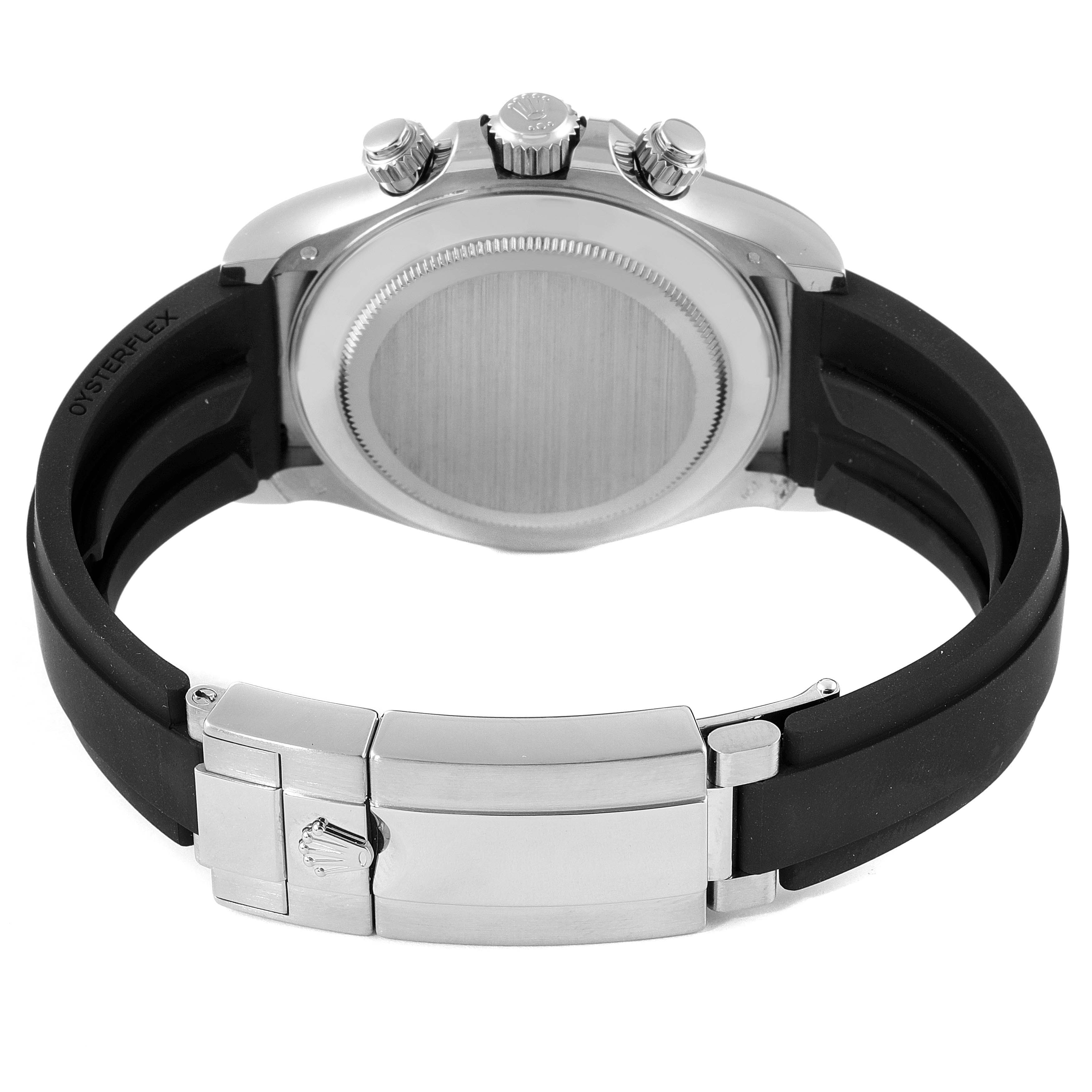 The image shows the back side of a Rolex Daytona 116519 Men's White Gold Grey Dial 116519 Men's White Gold Grey Dial watch, highlighting the case back, crown, pushers, and rubber strap with a closed clasp.