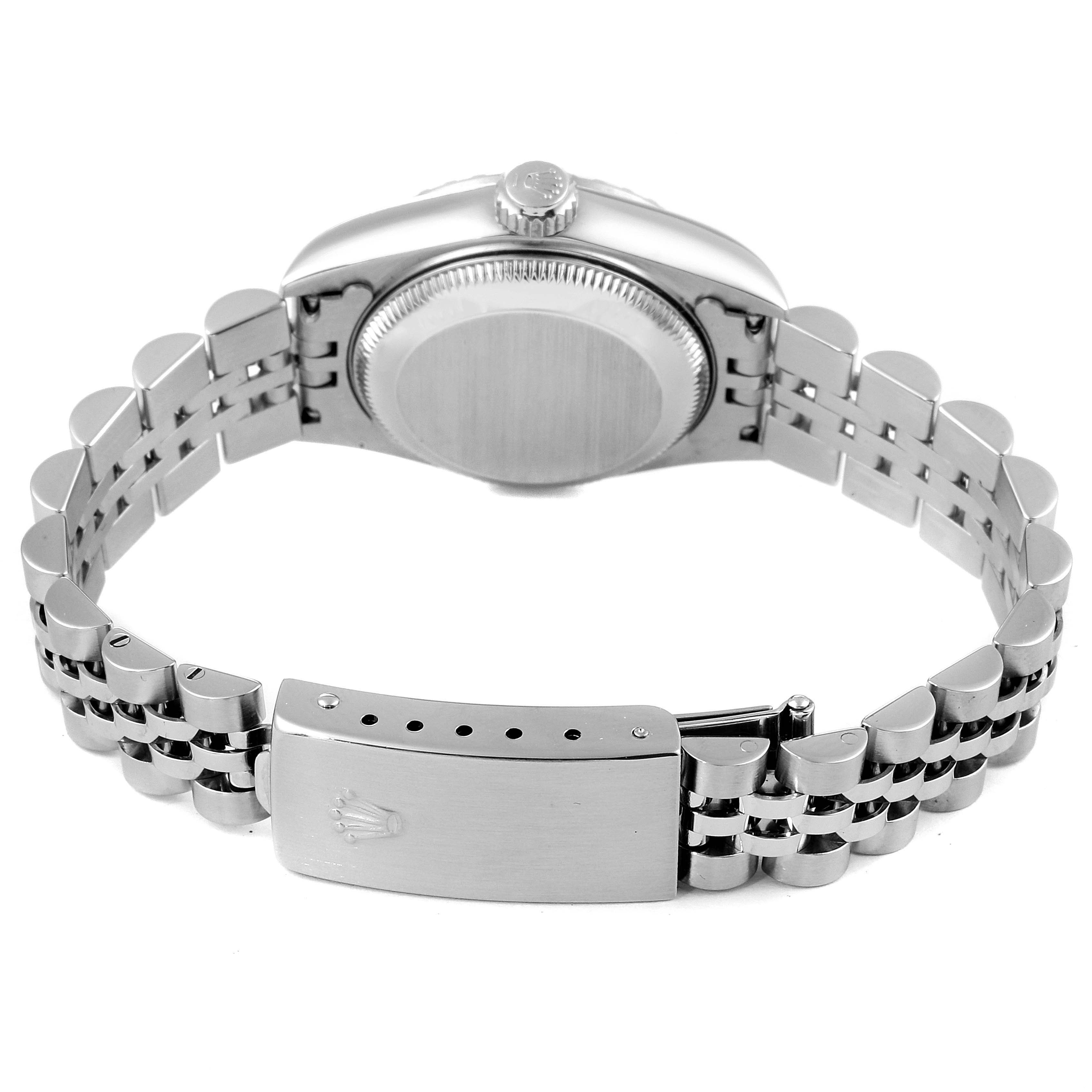 The image shows the back case and bracelet clasp of a Rolex Date 79240 Women's Stainless Steel Pink Dial 79240 Women's Stainless Steel Pink Dial model watch from a rear angle.