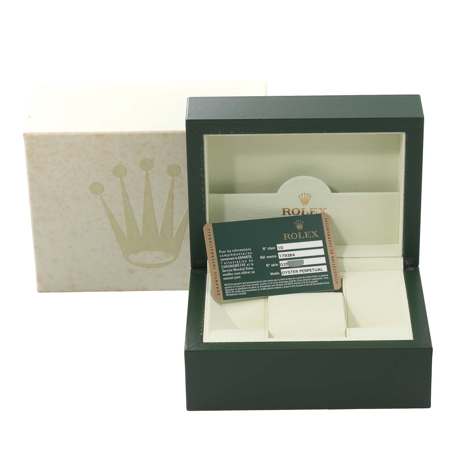 This image shows the open green and beige presentation box with an authenticity card for a Rolex Datejust 179384 Women's Stainless Steel White Dial 179384 Women's Stainless Steel White Dial model watch.