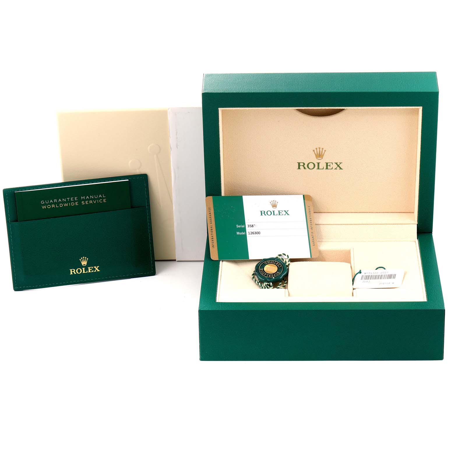 The image shows a Rolex Datejust 41 126300 Men
s Stainless Steel Blue Dial 126300 Men
s Stainless Steel Blue Dial watch packaging, including the box, warranty card, and tag accessories.