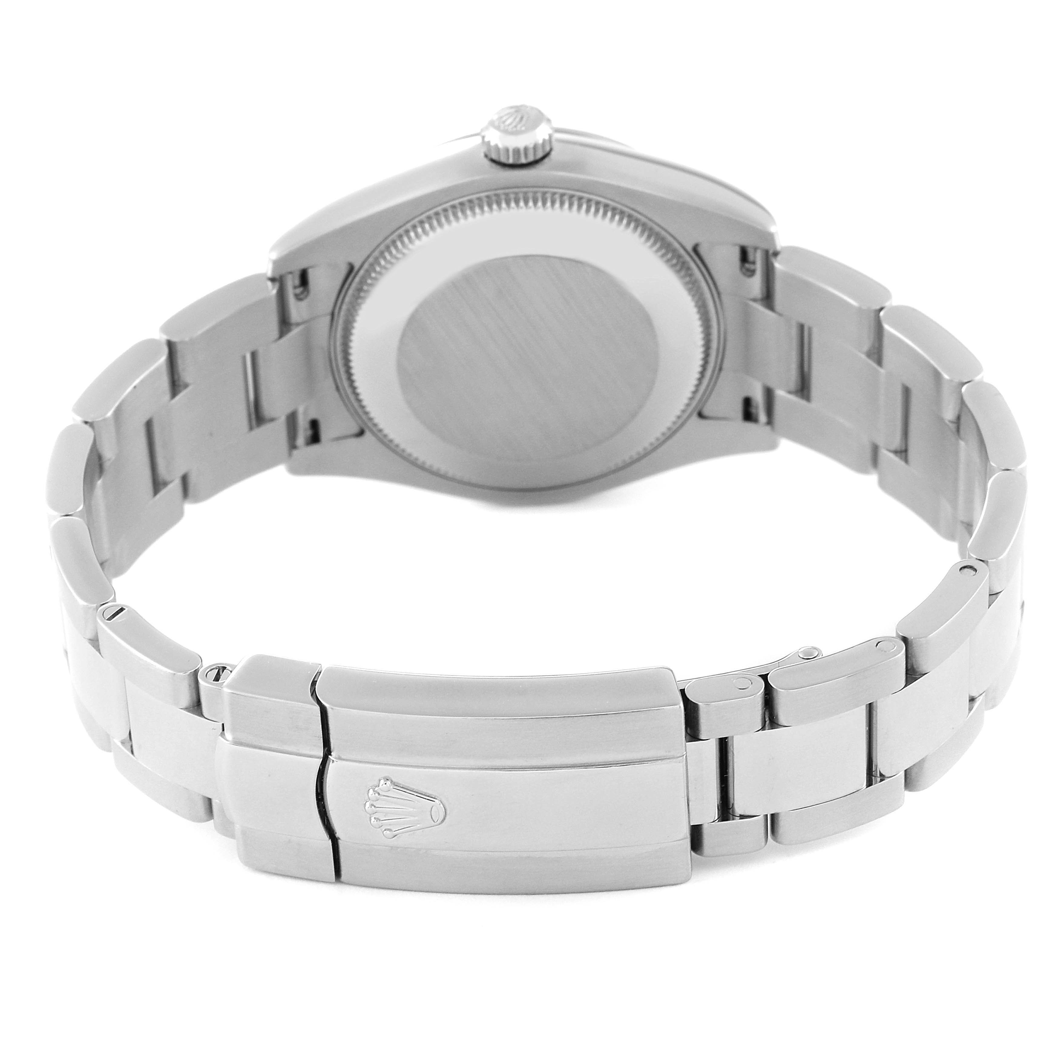 The image shows the back of a Rolex Mid-Size 178274 Women
s Stainless Steel Silver Dial 178274 Women
s Stainless Steel Silver Dial watch, highlighting the case back and clasp.