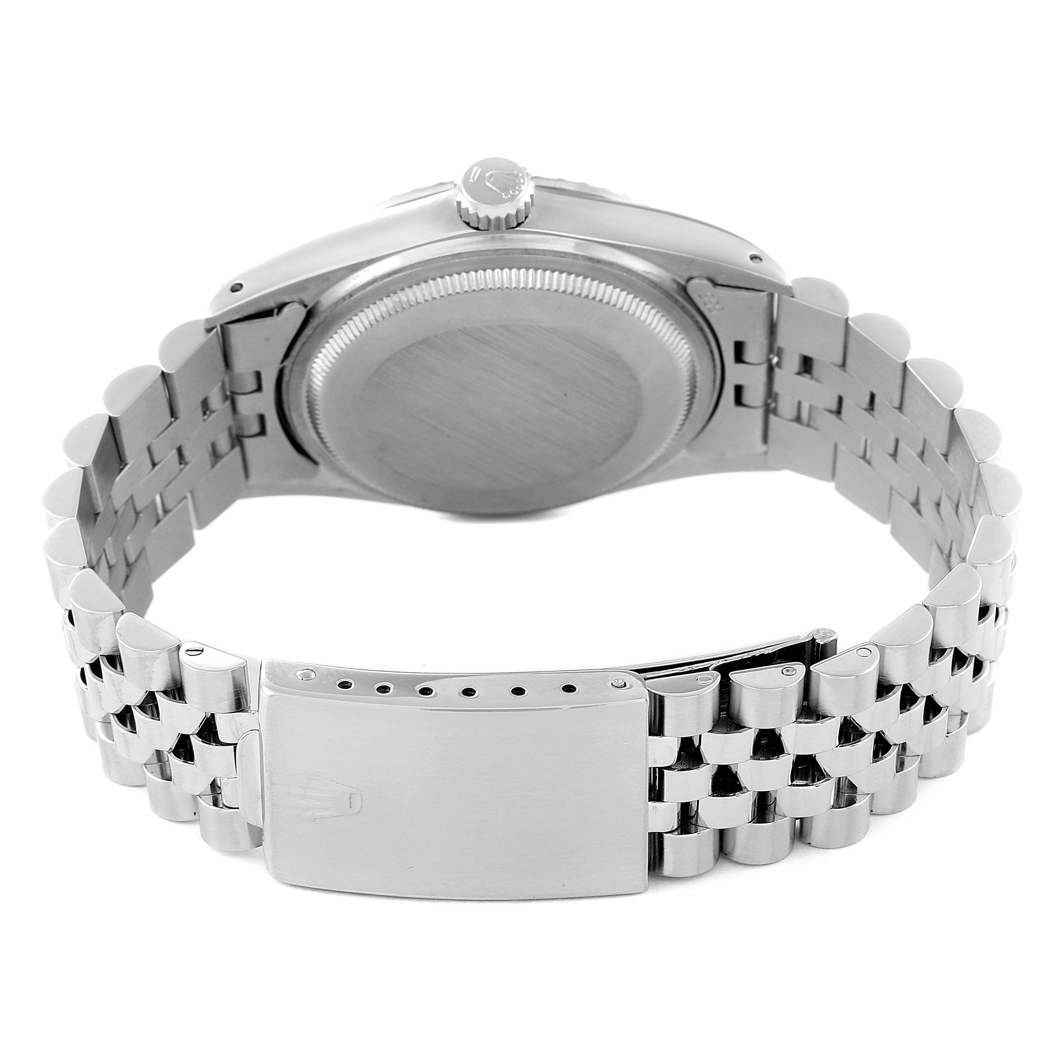 The image shows the back case and bracelet clasp of a Rolex Vintage Collection 16030 Men's Stainless Steel Silver Dial 16030 Men's Stainless Steel Silver Dial watch.