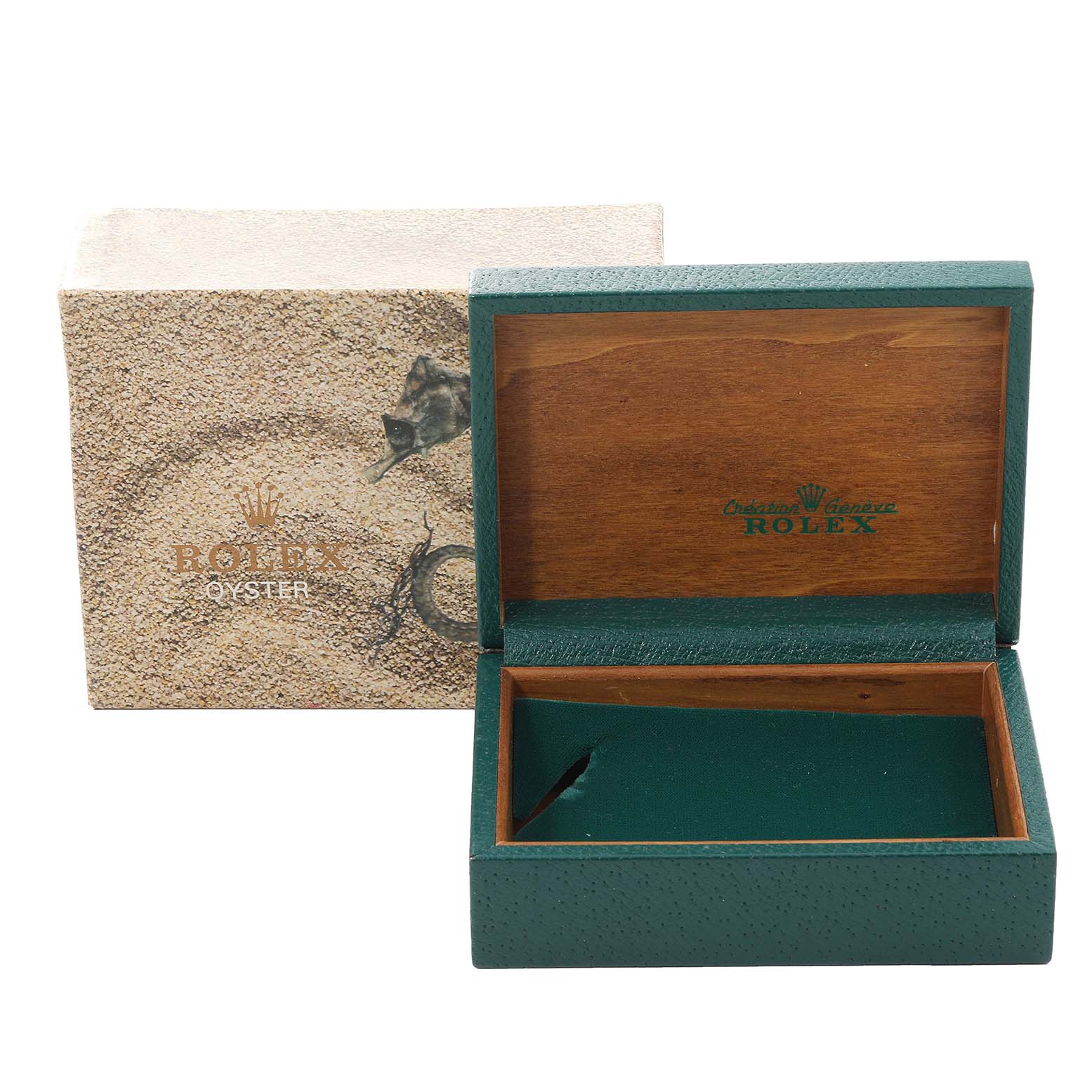 The image shows an open box and an outer case for the Vintage Collection model by Rolex, viewed from the front.