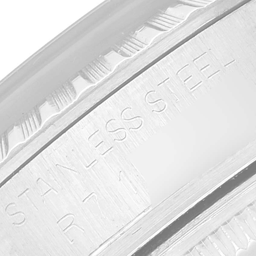 This image shows a close-up of the stainless steel bezel and engraving on the Rolex Vintage Collection 16030 Men's Stainless Steel Silver Dial 16030 Men's Stainless Steel Silver Dial model watch.