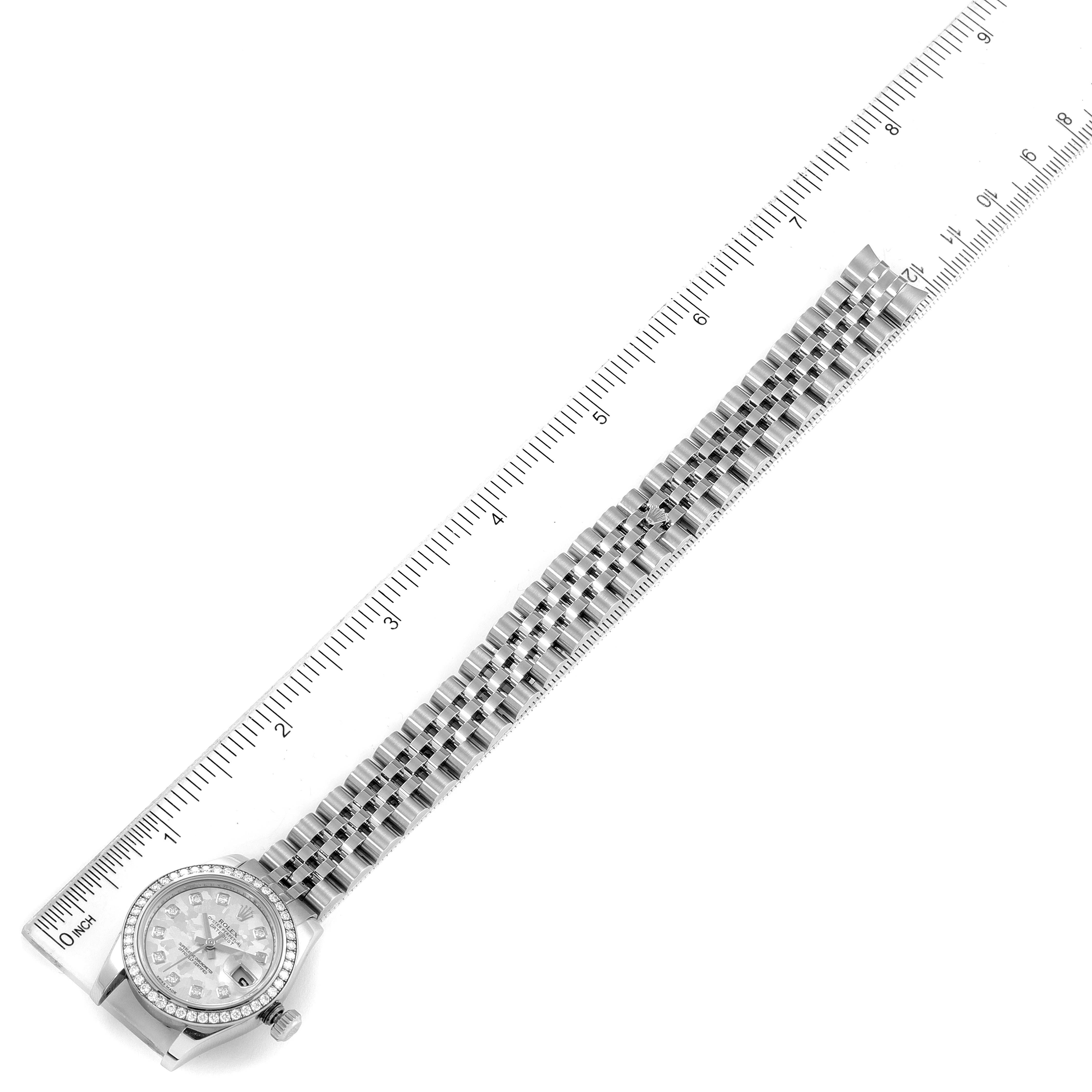 The image shows the face and bracelet of a Rolex Datejust 179384 Women's Stainless Steel Silver Dial 179384 Women's Stainless Steel Silver Dial watch alongside a ruler for measurement.