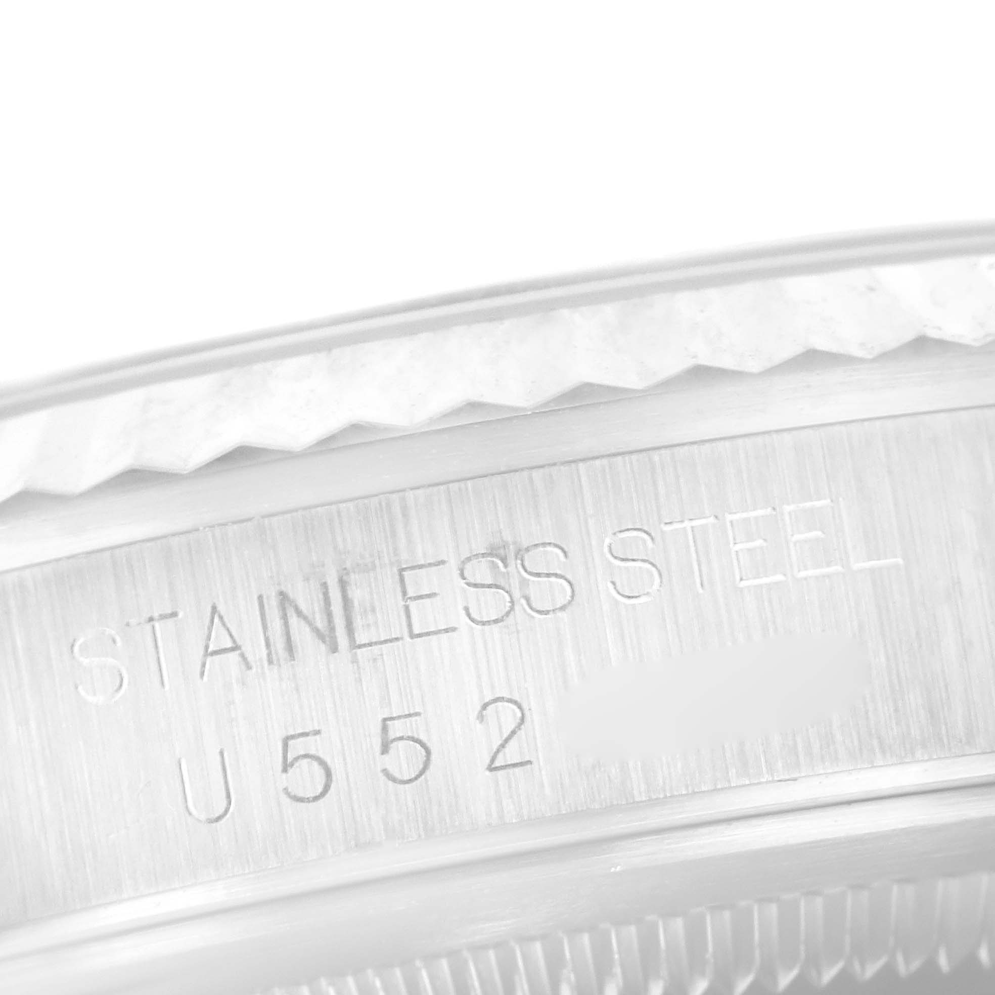 This image shows the side engraving on the stainless steel case of a Rolex Datejust 16234 Men's Stainless Steel Mother of Pearl Dial 16234 Men's Stainless Steel Mother of Pearl Dial watch.