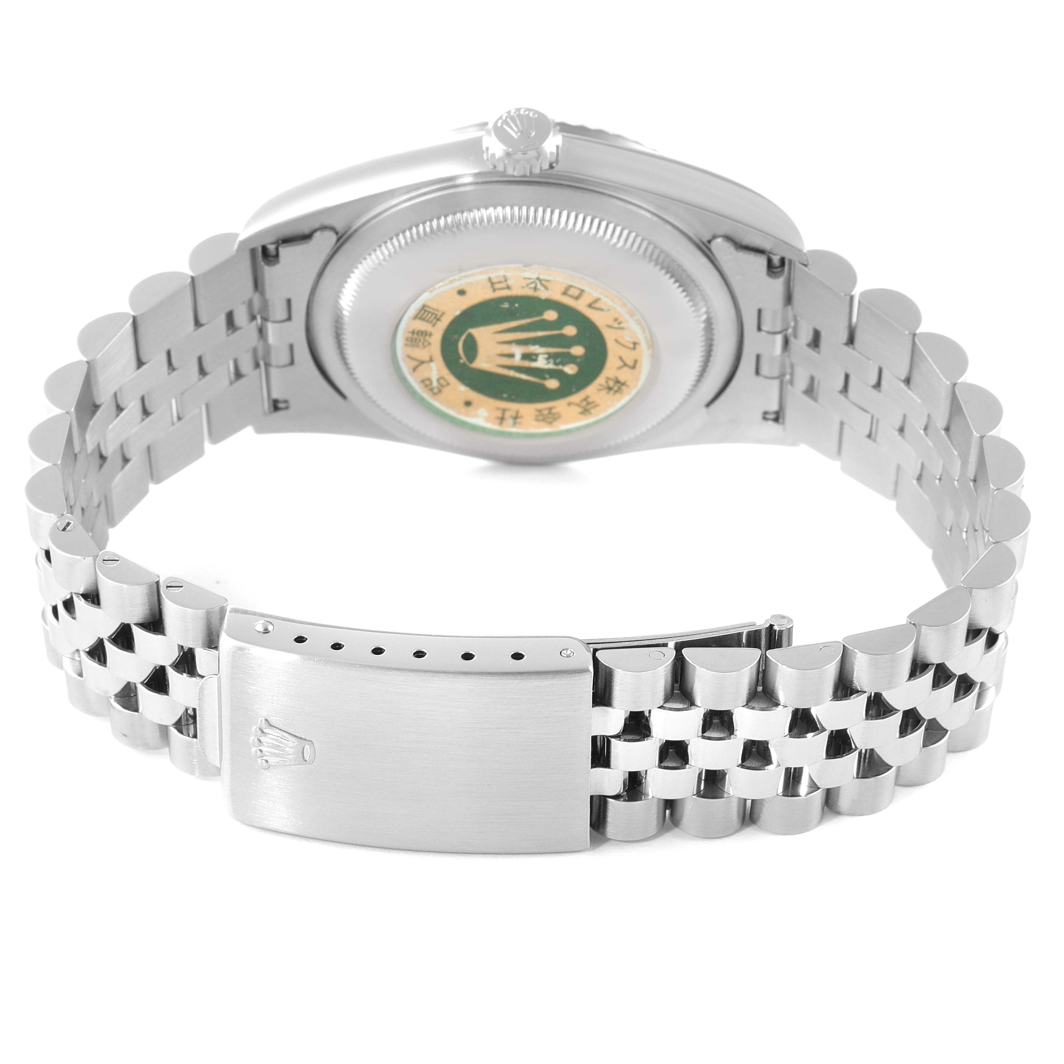 The image shows the back view of a Rolex Datejust 16234 Men's Stainless Steel Mother of Pearl Dial 16234 Men's Stainless Steel Mother of Pearl Dial watch, highlighting its case back and jubilee bracelet with clasp.