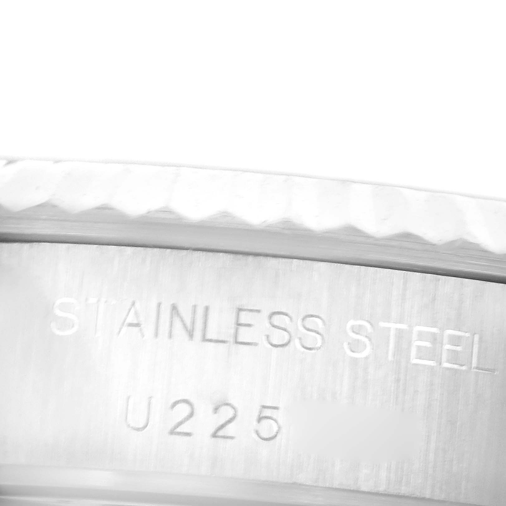 This close-up image shows the serial number and stainless steel engraving on the side of the case for a Rolex Datejust 69174 Women's Stainless Steel Pink Dial 69174 Women's Stainless Steel Pink Dial watch.