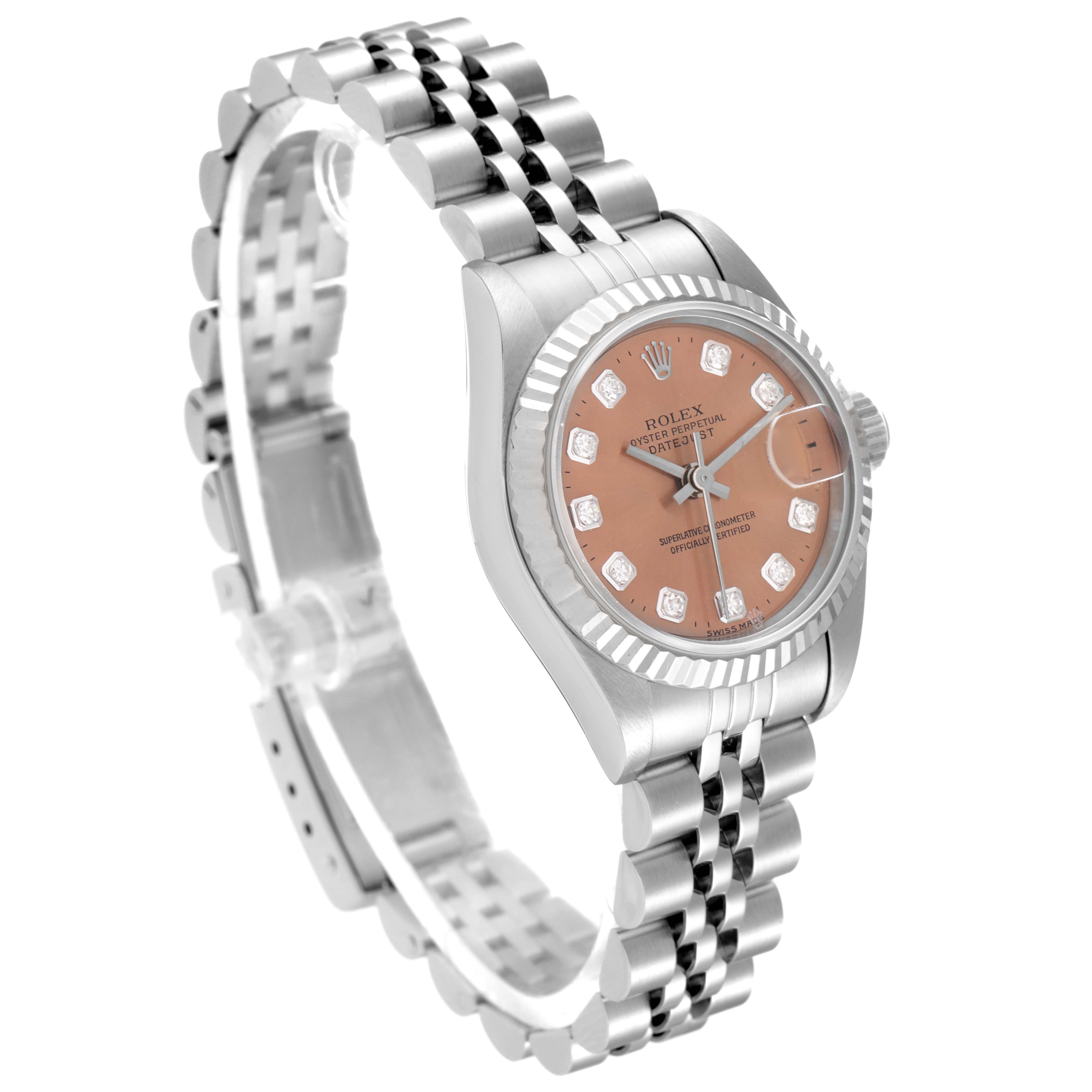 The Rolex Datejust 69174 Women's Stainless Steel Pink Dial 69174 Women's Stainless Steel Pink Dial watch is shown at an angled side view, highlighting the dial, bezel, crown, and bracelet.
