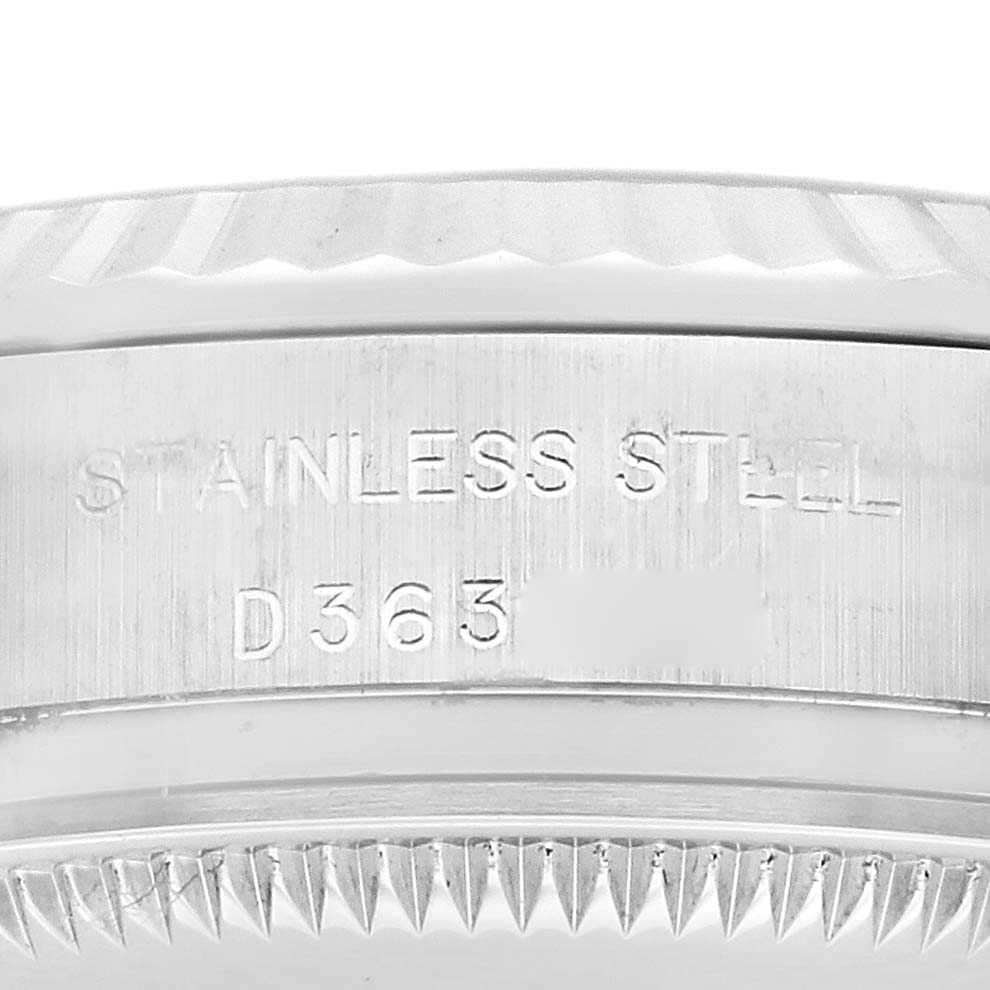 The image shows a close-up of the side engraving on the case back of a Rolex Datejust 179174 Women's Stainless Steel Silver Dial 179174 Women's Stainless Steel Silver Dial watch, indicating it is made of stainless steel.