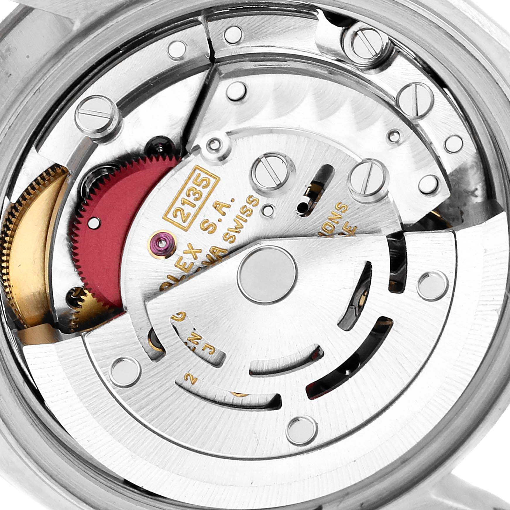 This image shows a close-up of the internal mechanism of a Rolex Datejust 69174 Women
s Stainless Steel Silver Dial 69174 Women
s Stainless Steel Silver Dial watch, focusing on the rotor and gears.