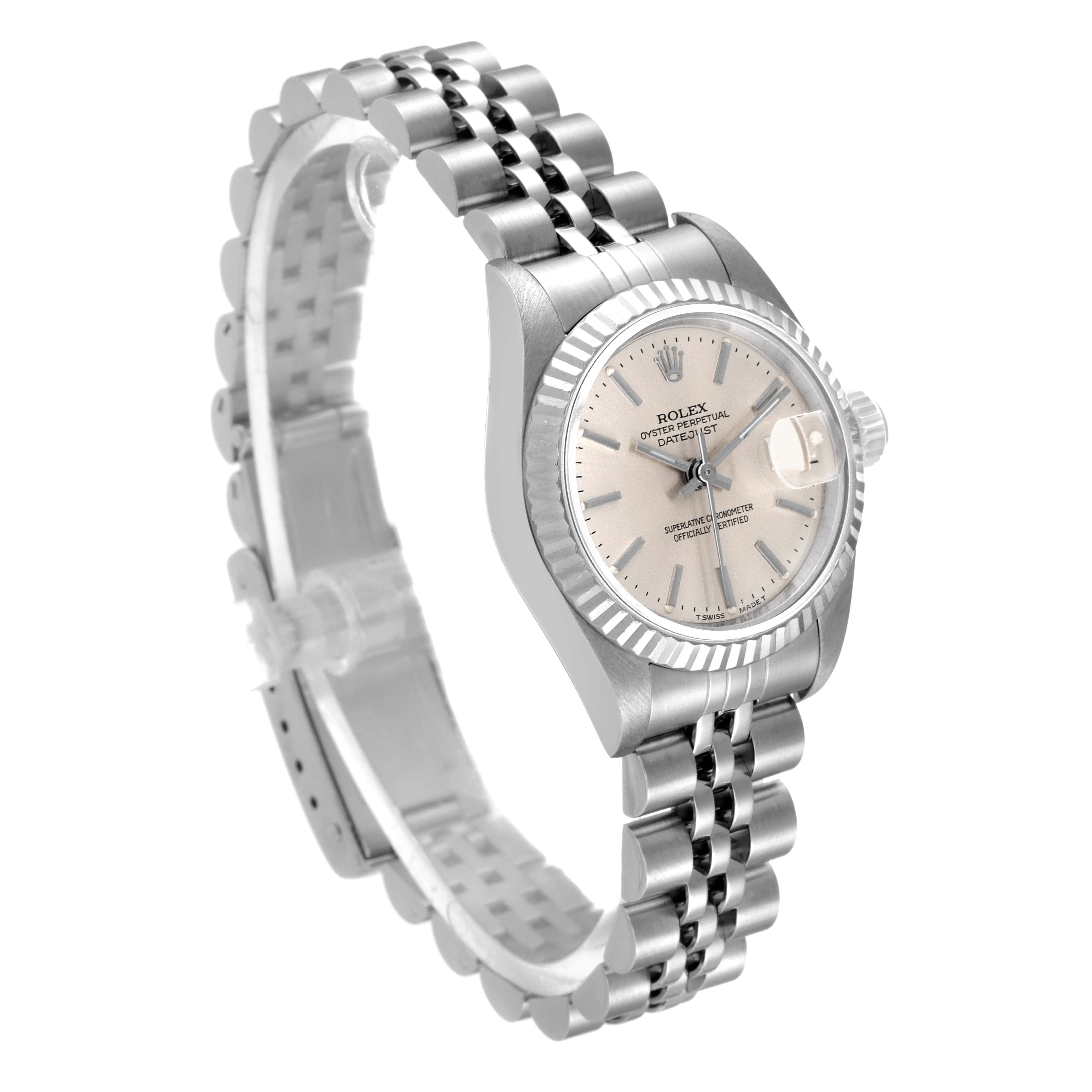This image shows a side angle of a Rolex Datejust 69174 Women
s Stainless Steel Silver Dial 69174 Women
s Stainless Steel Silver Dial watch, displaying the face, bezel, and partially open bracelet.