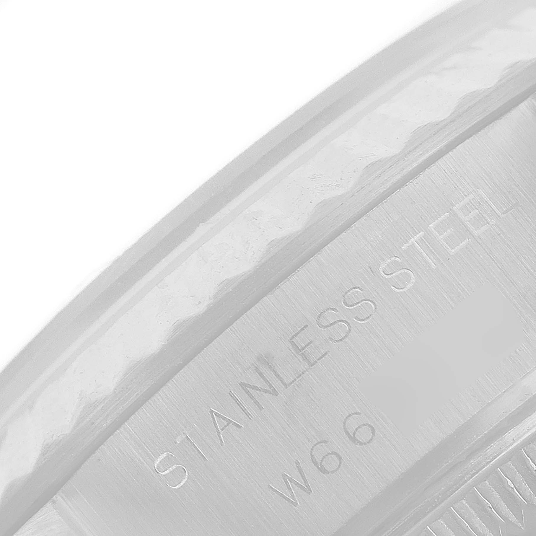 This image shows a close-up of the stainless steel engraving on the back of a Rolex Datejust 69174 Women
s Stainless Steel Silver Dial 69174 Women
s Stainless Steel Silver Dial watch.