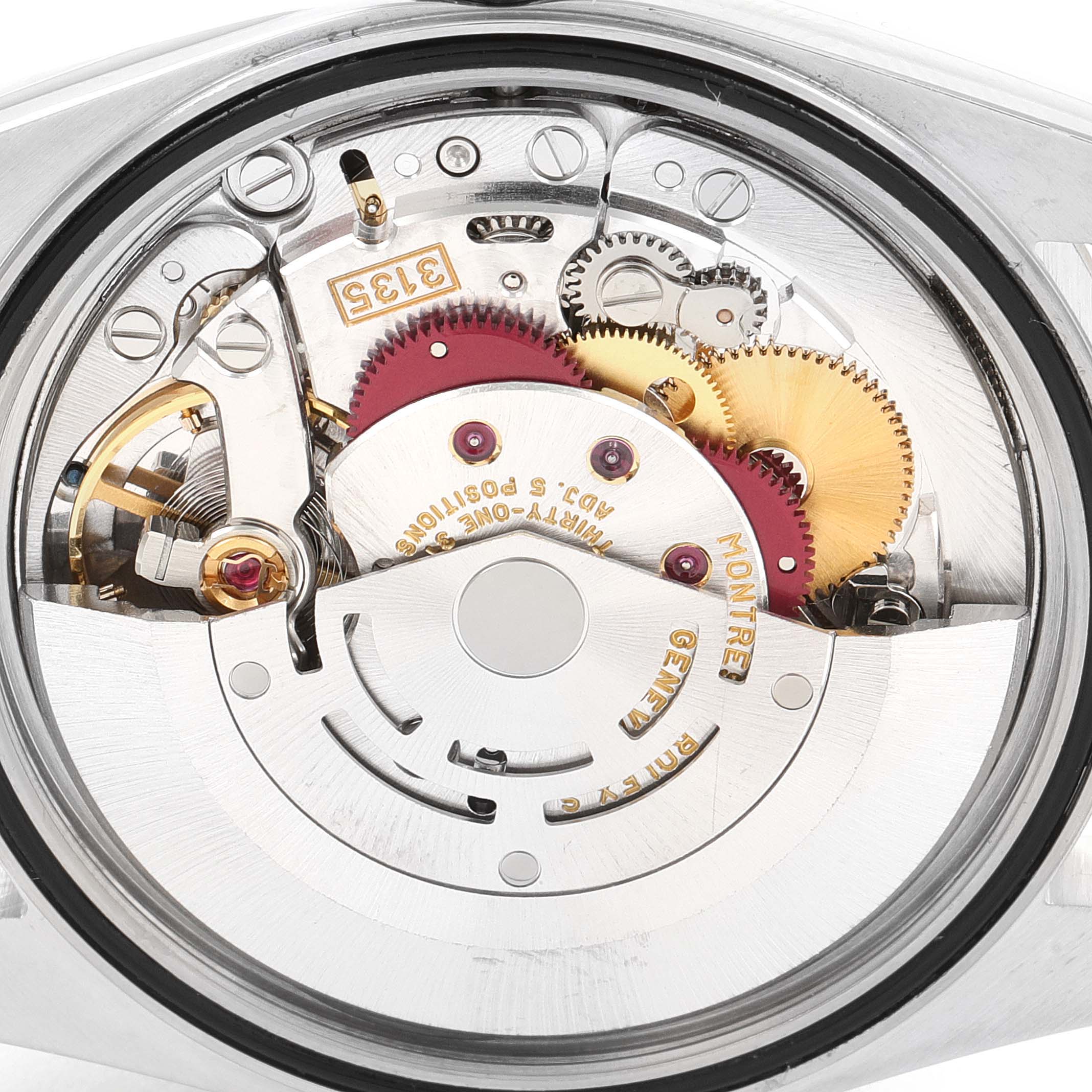 This image shows a close-up view of the movement components inside a Rolex Datejust 16233 Men's Steel and Gold (two tone) Mother of Pearl Dial 16233 Men's Steel and Gold (two tone) Mother of Pearl Dial watch.