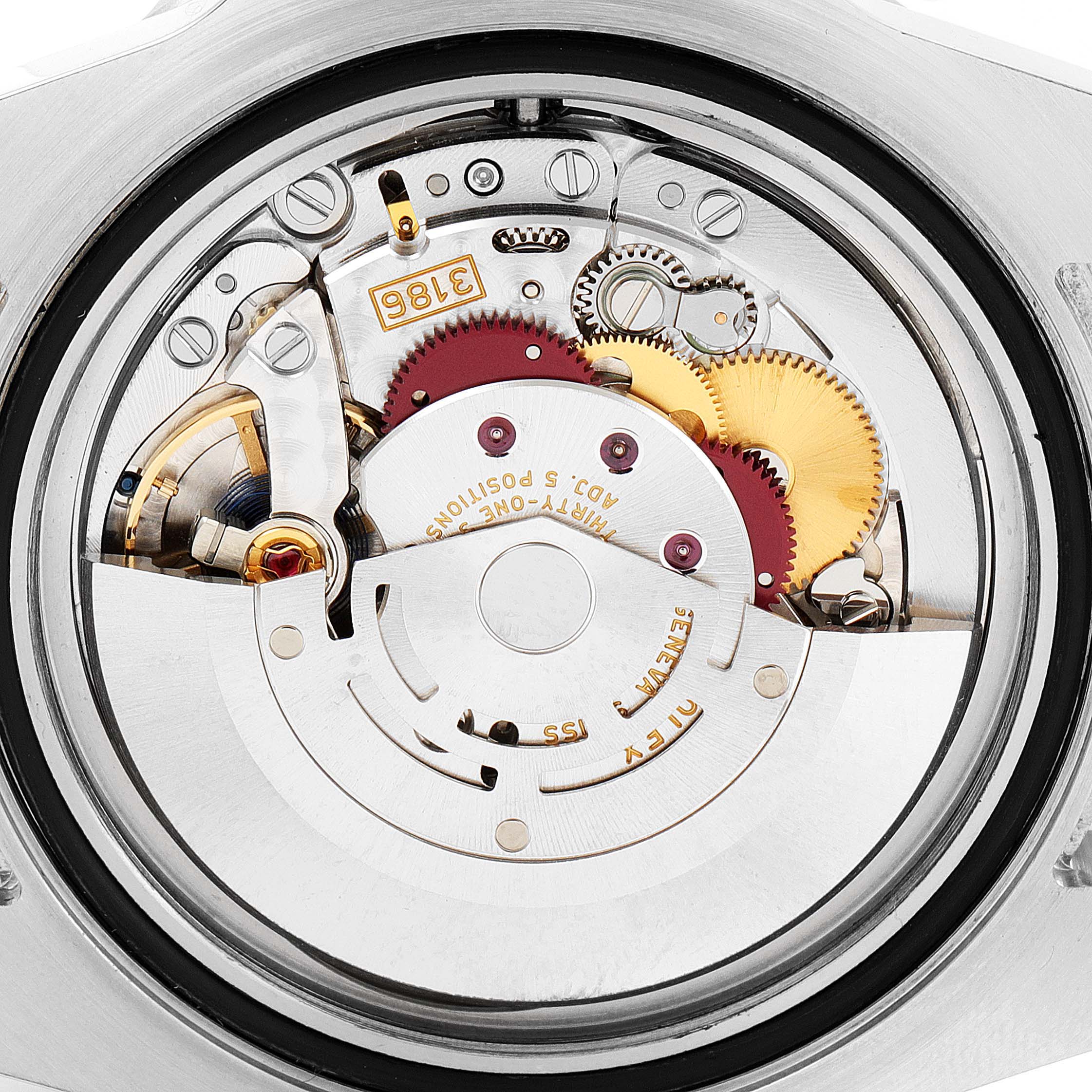 The image shows the inner mechanical components of the Rolex GMT-Master 116710BLNR Men's Stainless Steel Black Dial 116710BLNR Men's Stainless Steel Black Dial watch from a rear angle, detailing its movement.