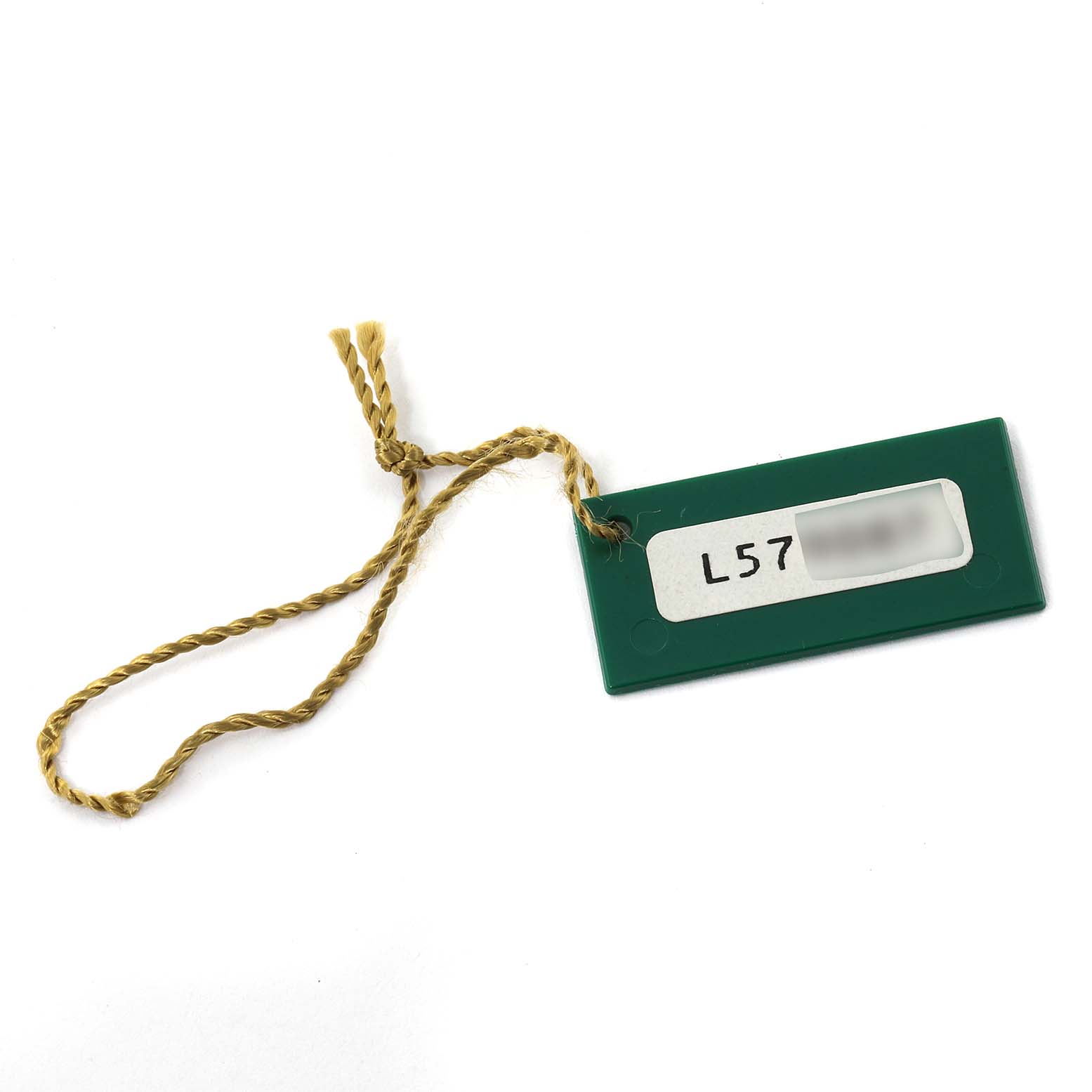 The image shows a green tag with a brown string, typically associated with the Rolex Oyster Perpetual 67194 Women's Stainless Steel Silver Dial 67194 Women's Stainless Steel Silver Dial model.