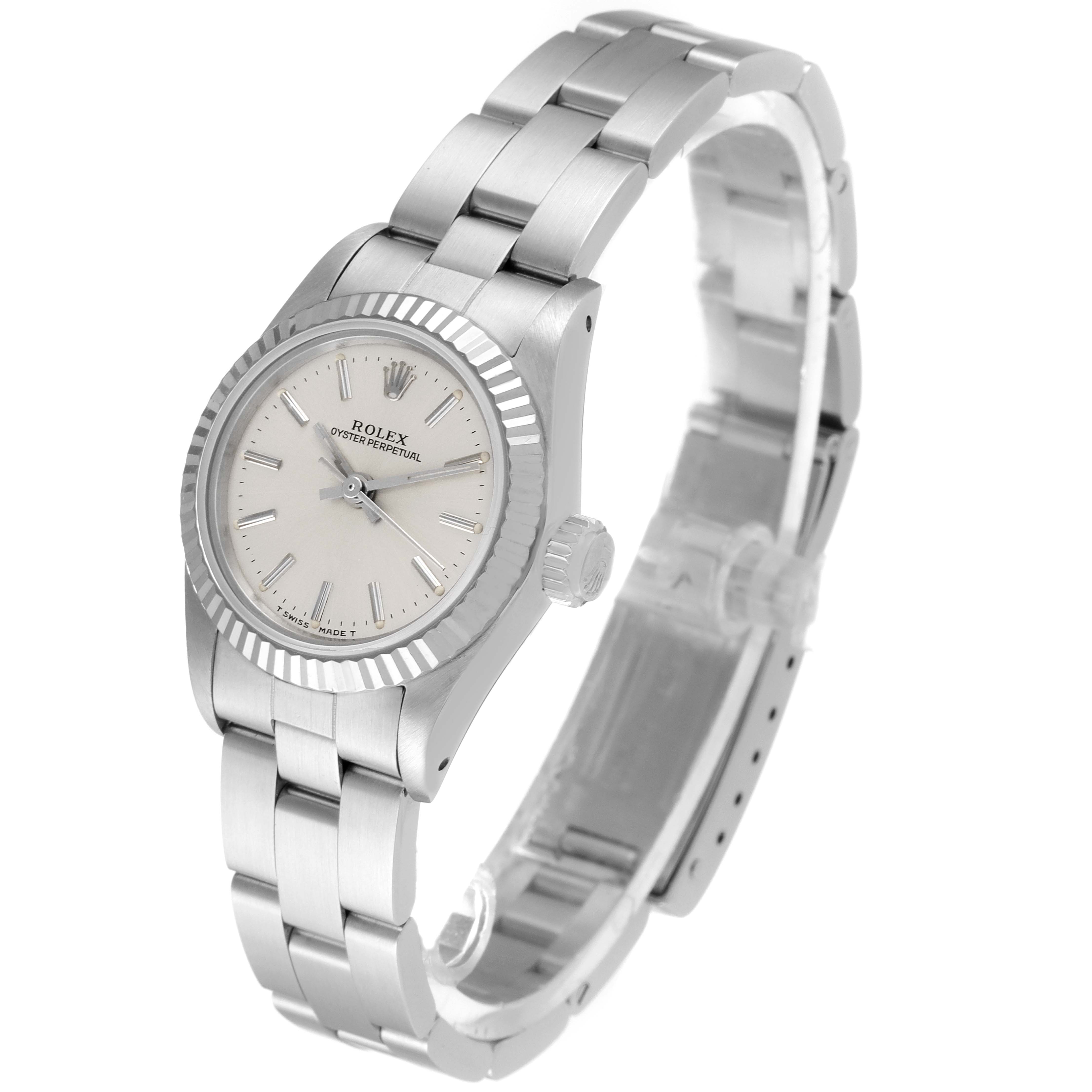 The image shows a Rolex Oyster Perpetual 67194 Women's Stainless Steel Silver Dial 67194 Women's Stainless Steel Silver Dial watch from an angled side view, highlighting the face, bezel, crown, and bracelet.