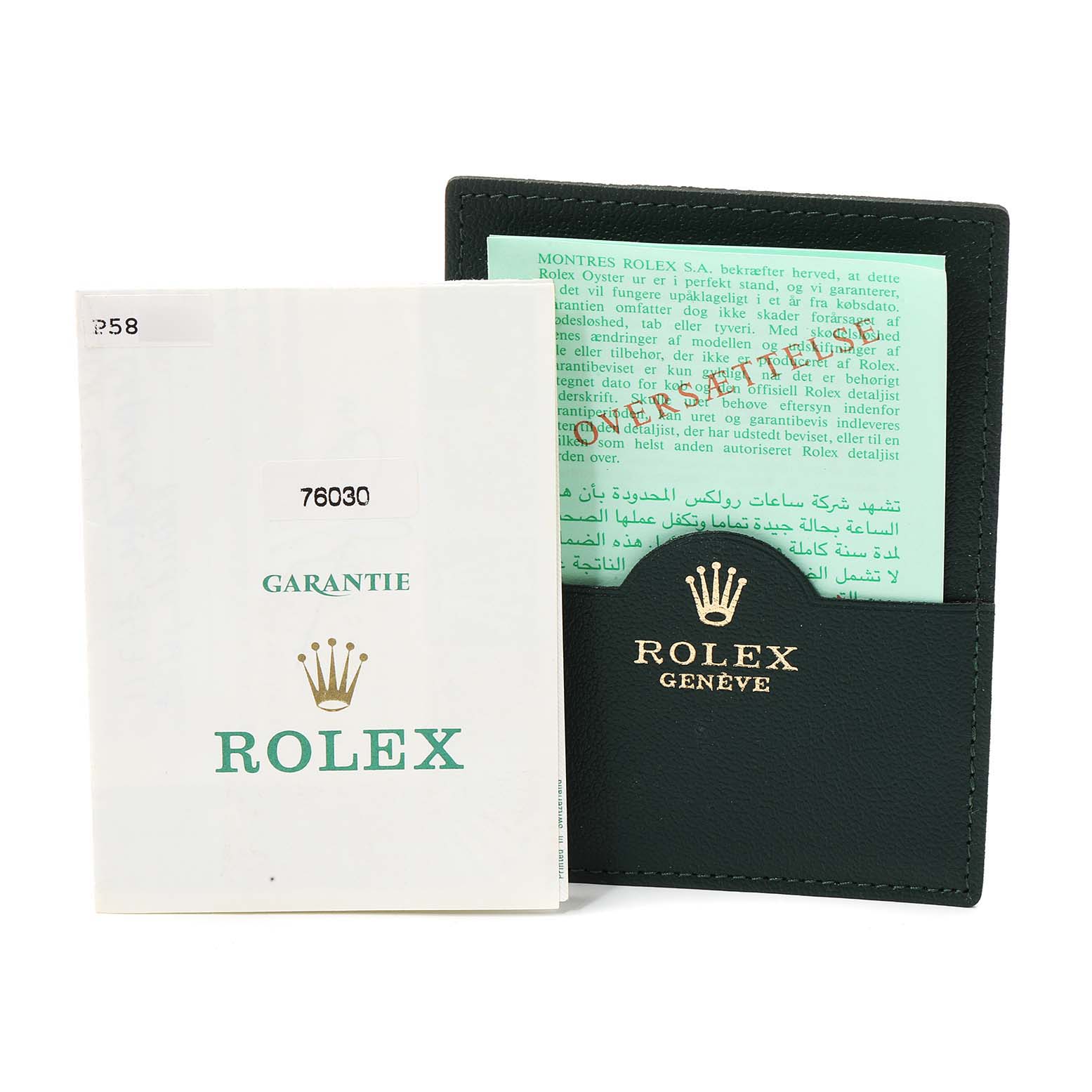 This image shows the warranty card and holder for the Rolex Oyster Perpetual 76030 Women's Stainless Steel Black Dial 76030 Women's Stainless Steel Black Dial model.