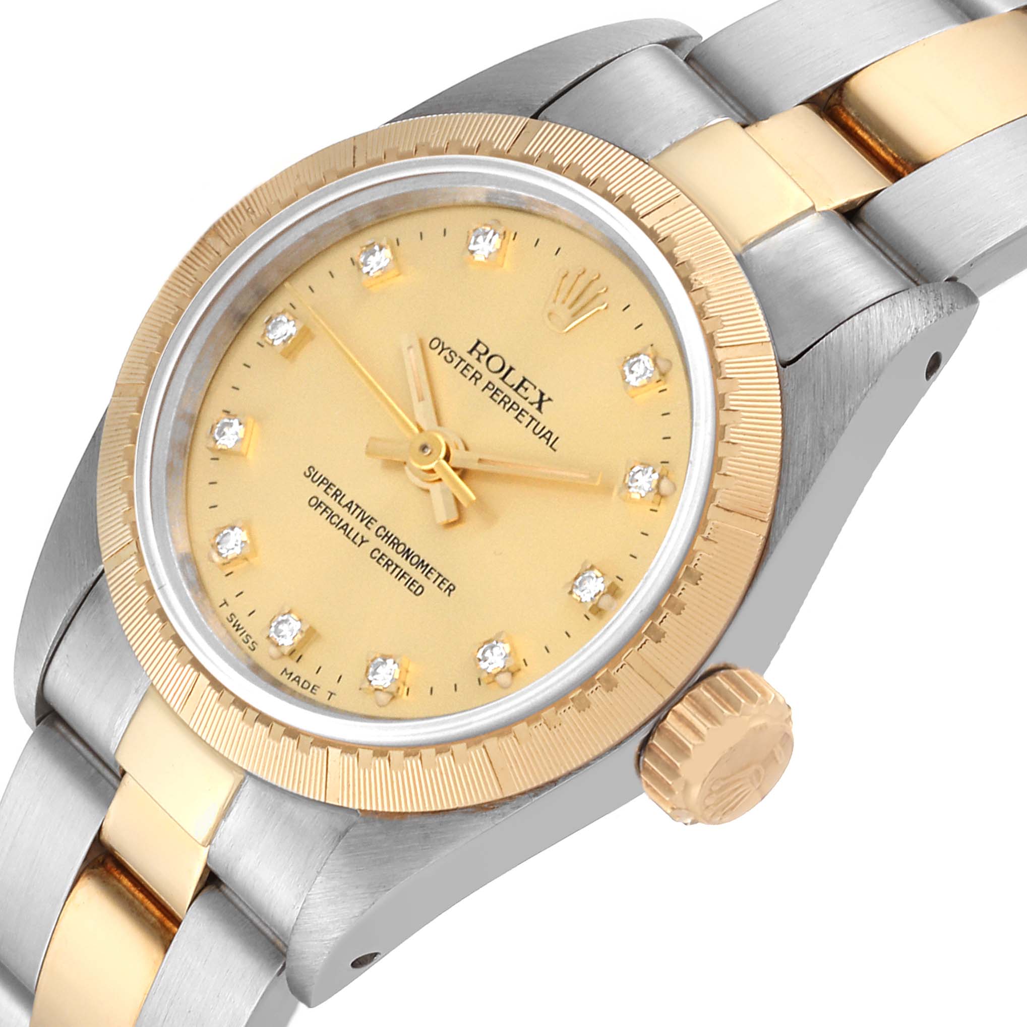 This image shows a close-up angled view of the face and part of the band of a Rolex Oyster Perpetual 67243 Women's Steel and Gold (two tone) Champagne Dial 67243 Women's Steel and Gold (two tone) Champagne Dial watch.
