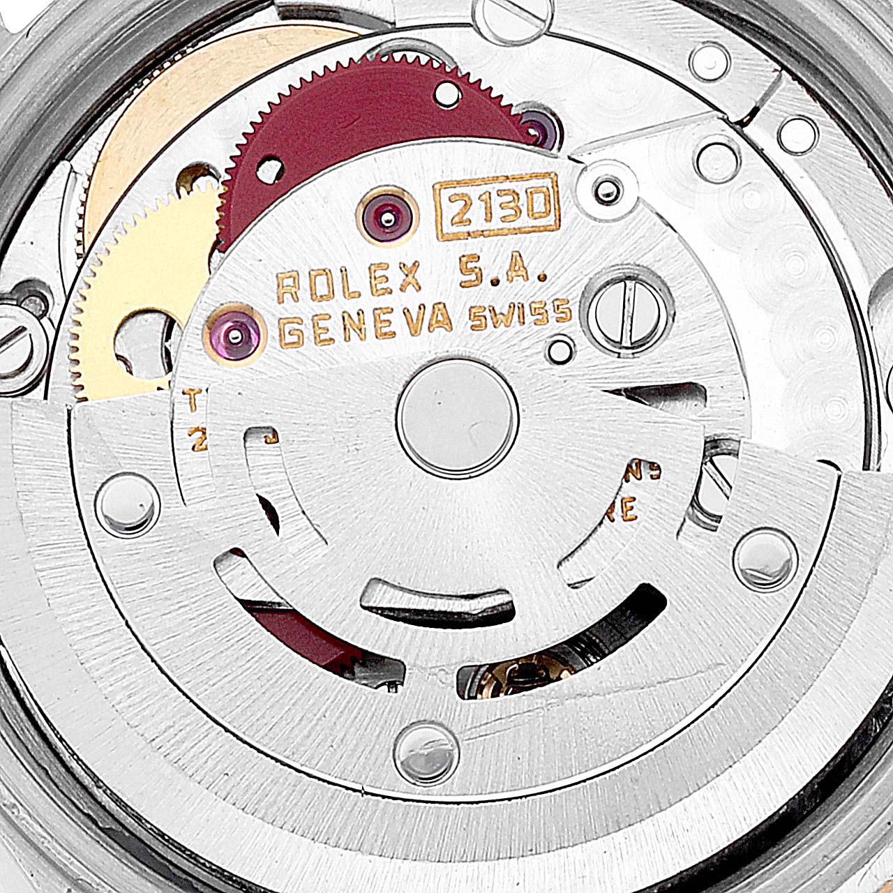 The image shows a close-up view of the movement mechanism of a Rolex Oyster Perpetual 67243 Women's Steel and Gold (two tone) Champagne Dial 67243 Women's Steel and Gold (two tone) Champagne Dial watch.