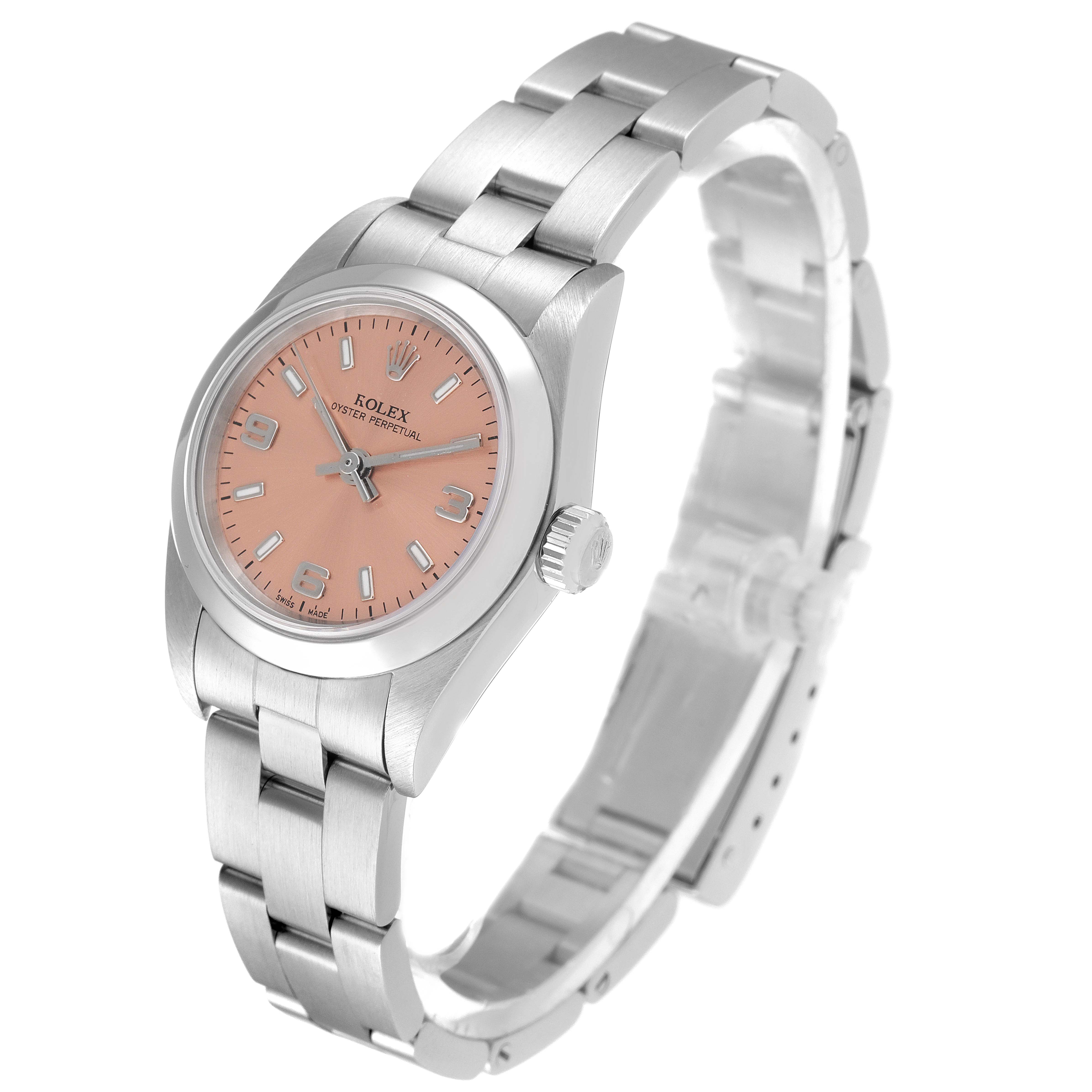 The image shows a Rolex Oyster Perpetual 76080 Women
s Stainless Steel Pink Dial 76080 Women
s Stainless Steel Pink Dial watch at an angle featuring its face, crown, and bracelet.