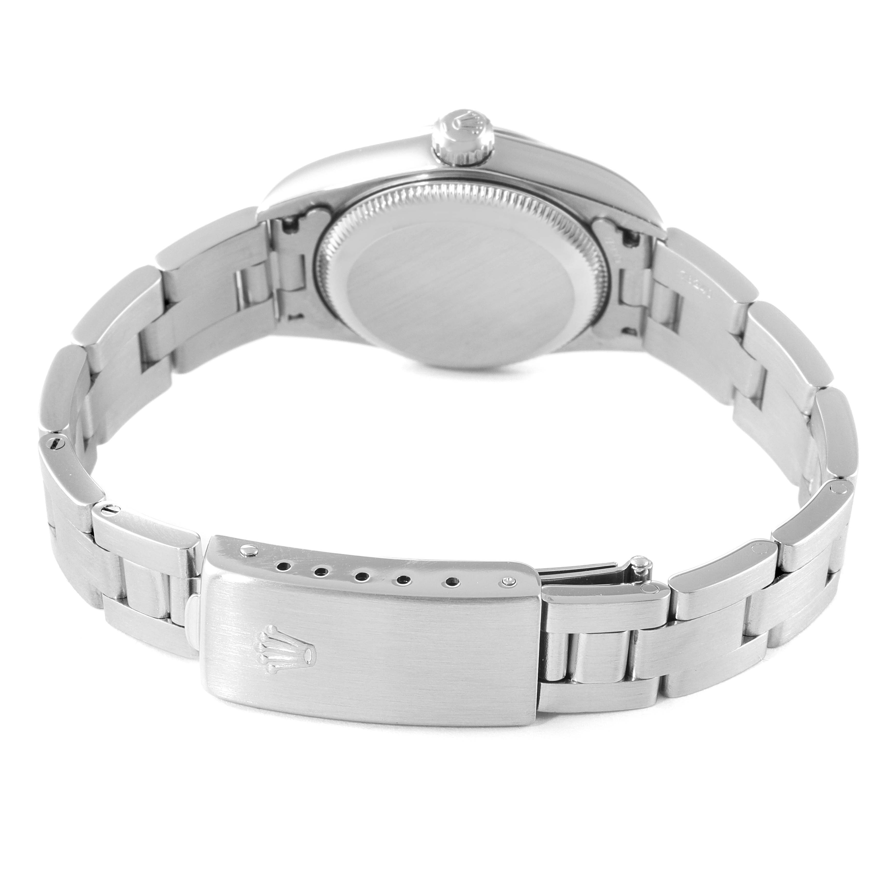 The image shows the back view of a Rolex Oyster Perpetual 76080 Women
s Stainless Steel Pink Dial 76080 Women
s Stainless Steel Pink Dial watch, highlighting the case back and bracelet clasp.