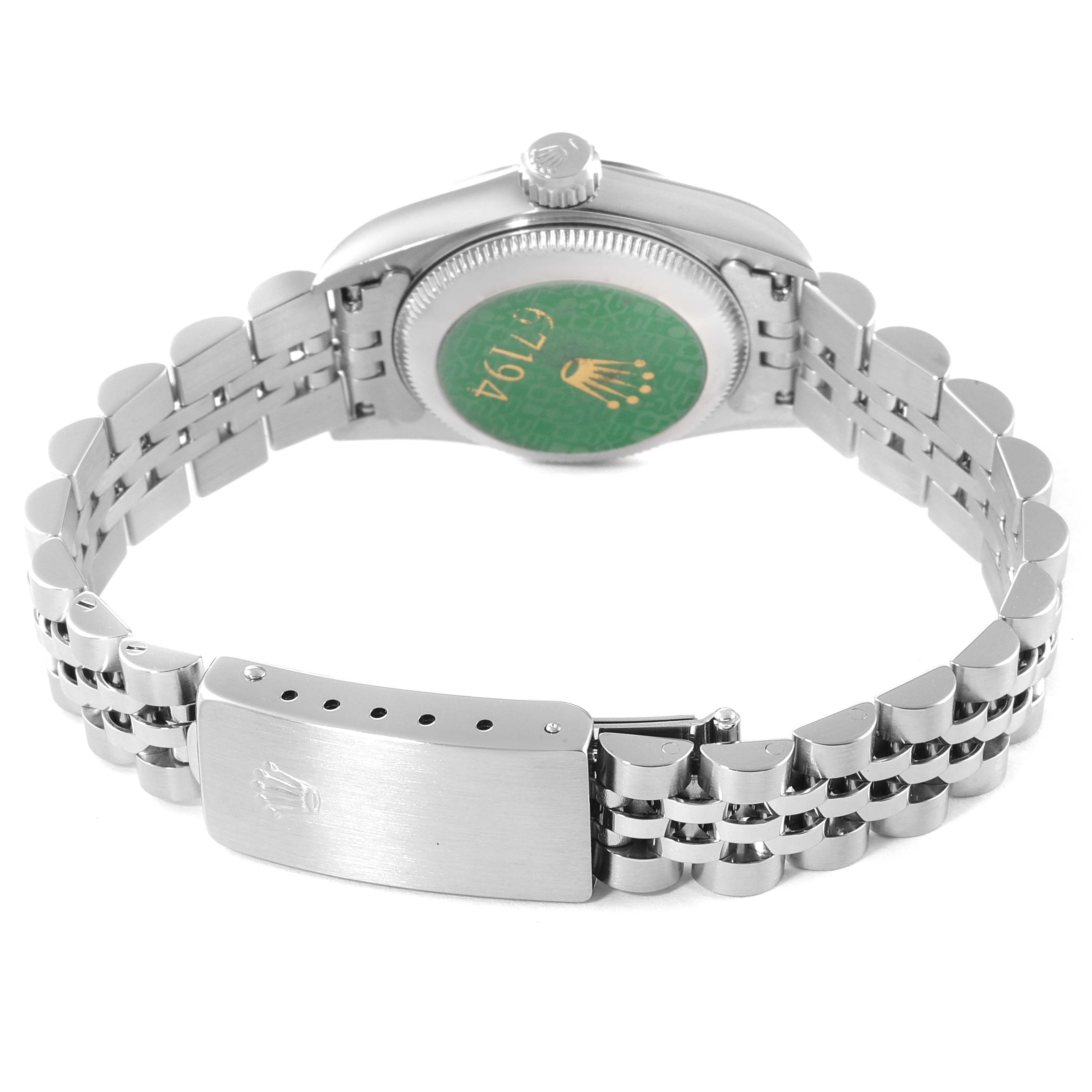 The image shows the back view of the Rolex Oyster Perpetual 67194 Women's Stainless Steel White Dial 67194 Women's Stainless Steel White Dial watch, highlighting the bracelet and clasp.