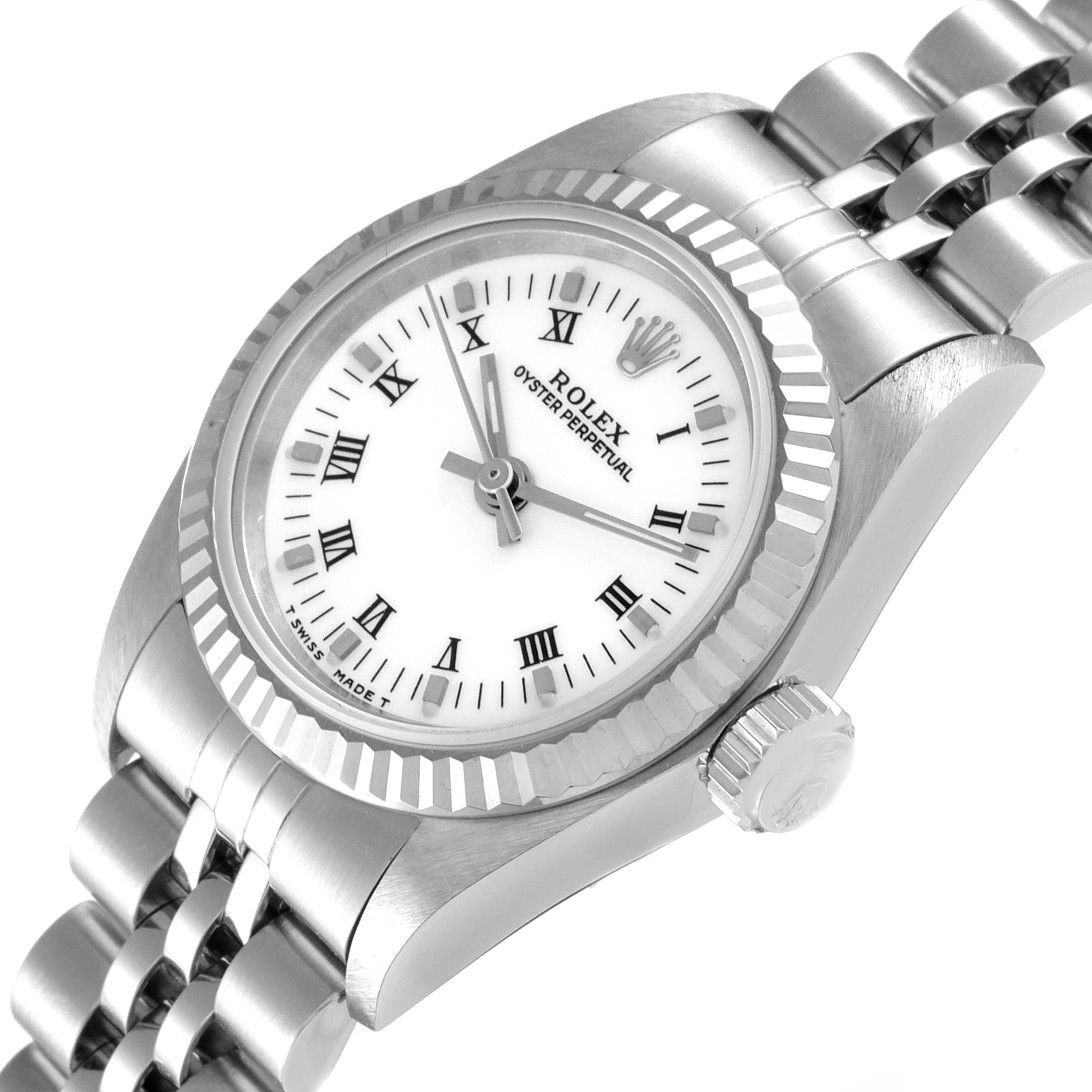 The image shows a top-side view of a Rolex Oyster Perpetual 67194 Women's Stainless Steel White Dial 67194 Women's Stainless Steel White Dial watch, displaying the dial, fluted bezel, and part of the bracelet.