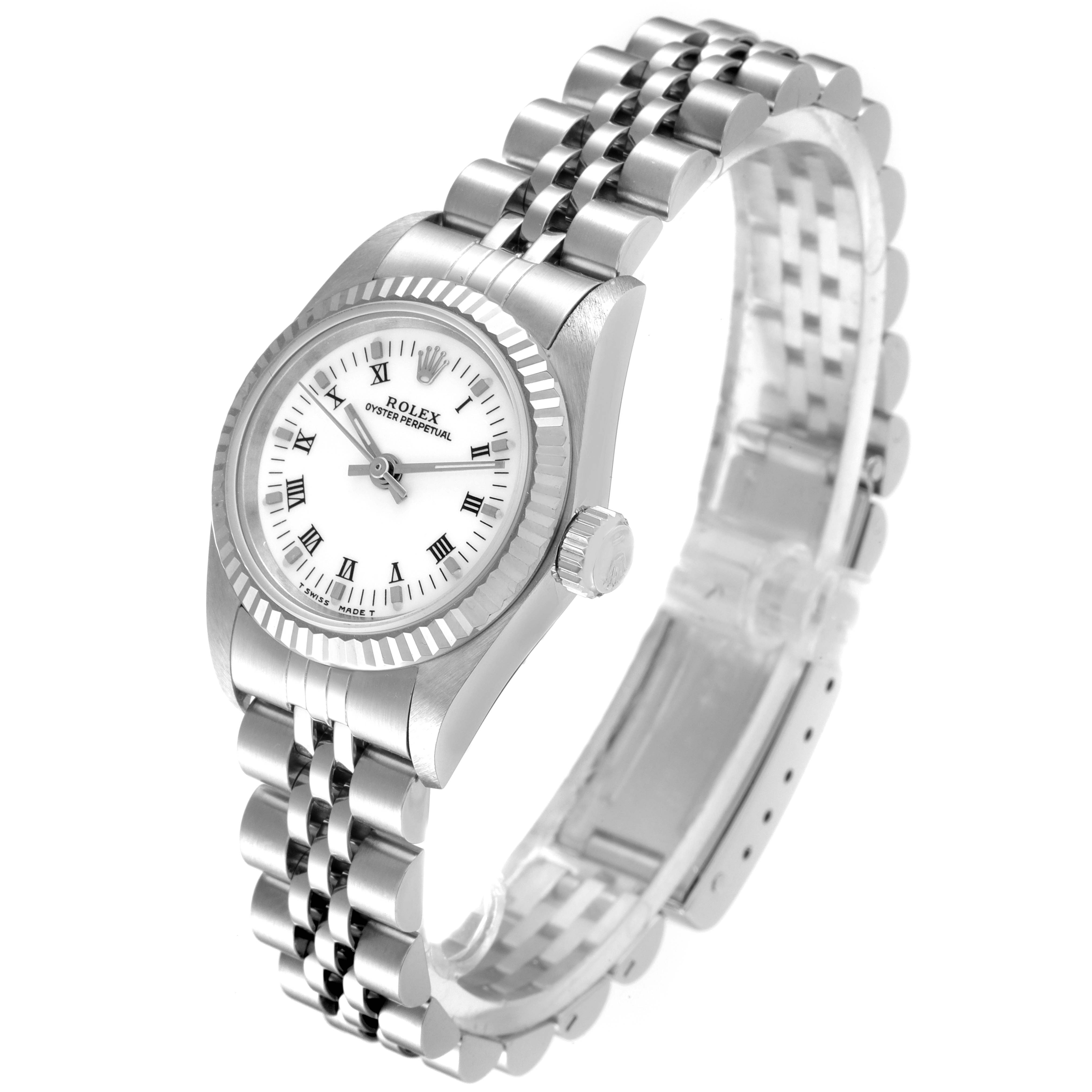 The Rolex Oyster Perpetual 67194 Women's Stainless Steel White Dial 67194 Women's Stainless Steel White Dial watch is shown at a semi-side angle, displaying the face, crown, and bracelet.