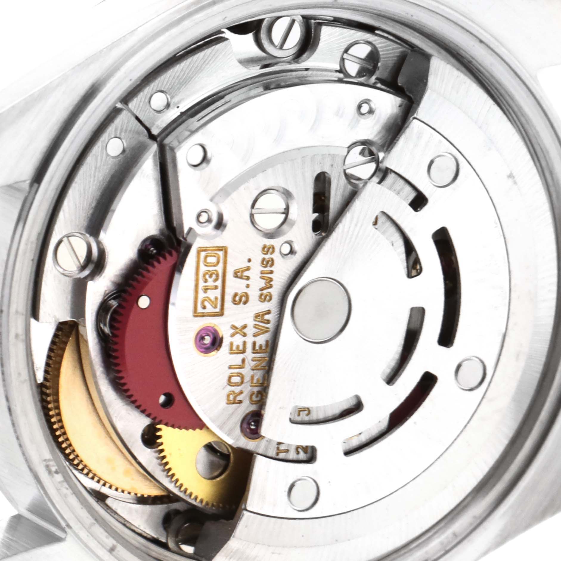 This image shows a close-up of the Rolex Oyster Perpetual 67194 Women's Stainless Steel White Dial 67194 Women's Stainless Steel White Dial model's inner mechanical movement parts.