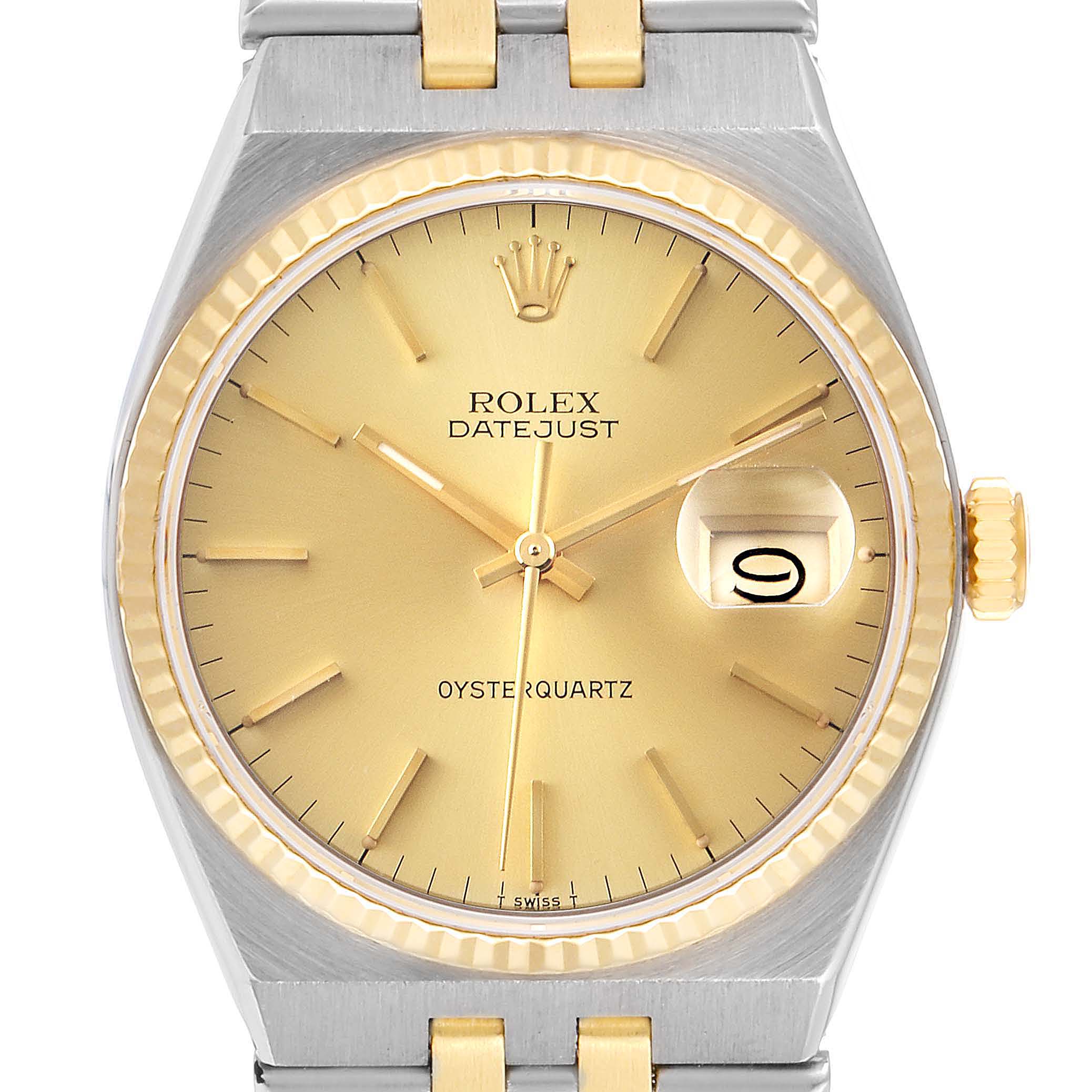 The image shows a frontal view of a Rolex Oysterquartz 17013 Men's Steel and Gold (two tone) Champagne Dial 17013 Men's Steel and Gold (two tone) Champagne Dial Datejust watch, highlighting its dial, bezel, and crown.