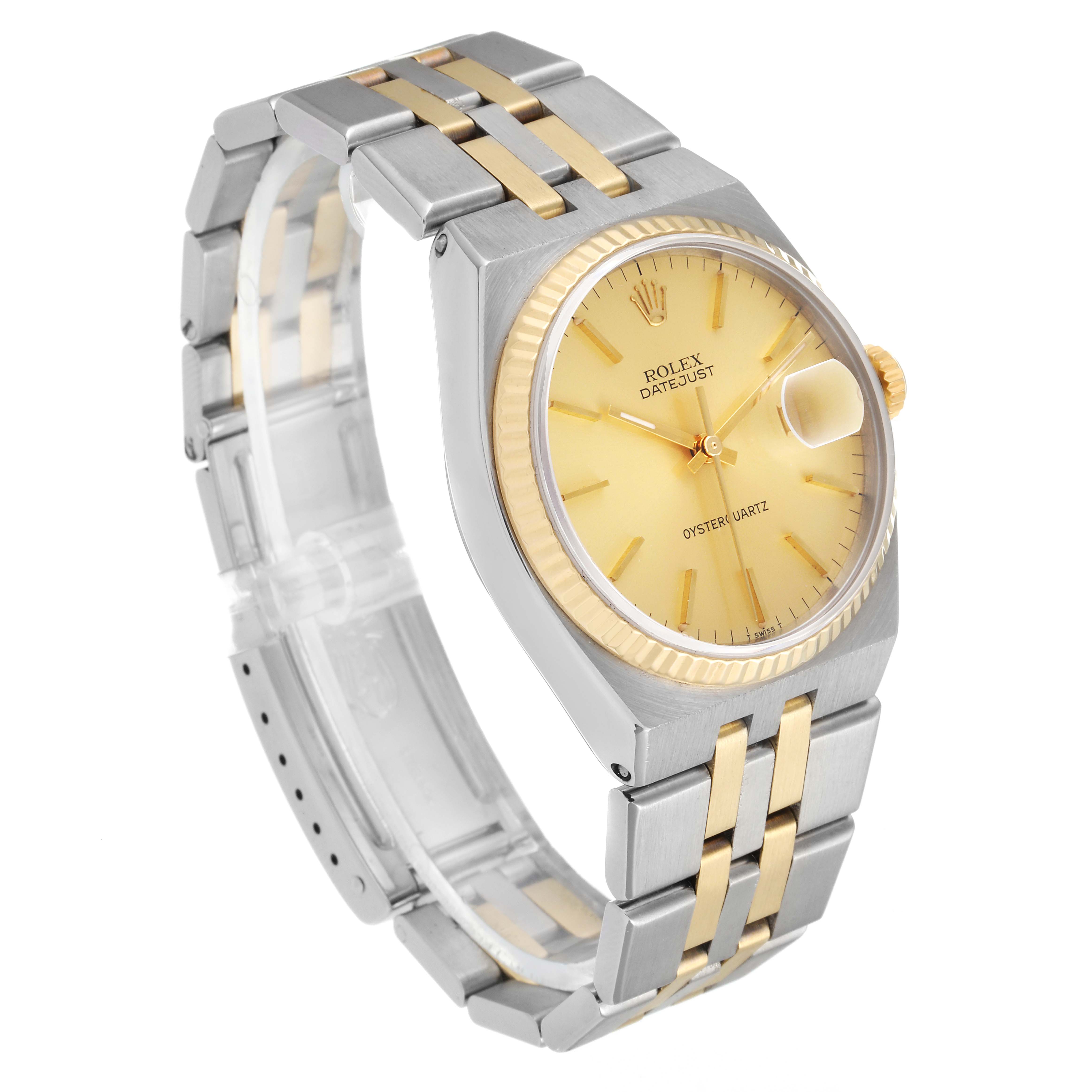 The Rolex Oysterquartz 17013 Men's Steel and Gold (two tone) Champagne Dial 17013 Men's Steel and Gold (two tone) Champagne Dial watch is shown at a three-quarter angle, displaying its yellow dial, bracelet, and fluted bezel.
