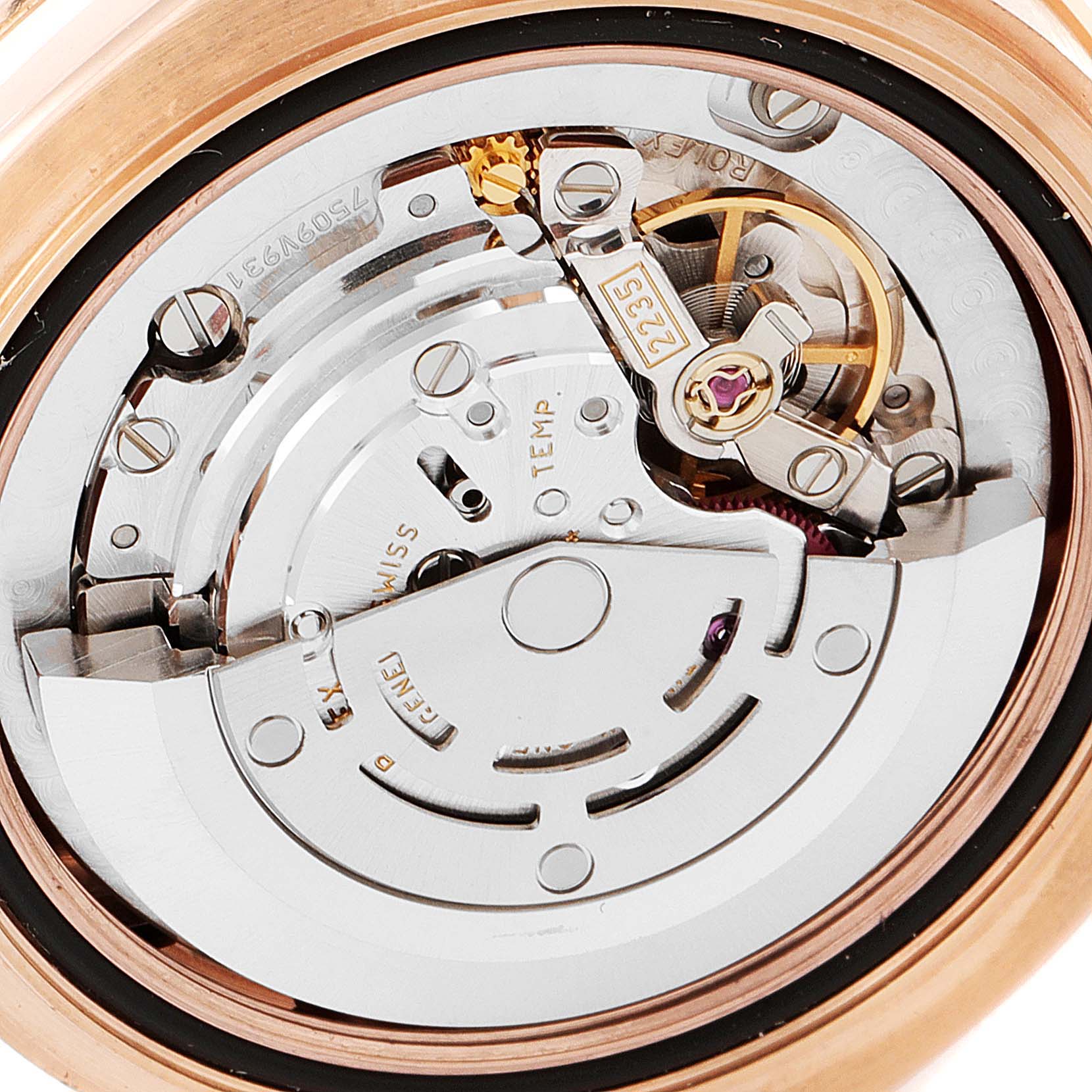 This image shows a close-up of the movement mechanism of a Rolex Pearlmaster 81315 Women
s Rose Gold Pink Dial 81315 Women
s Rose Gold Pink Dial watch, focusing on the inner components and intricate design.