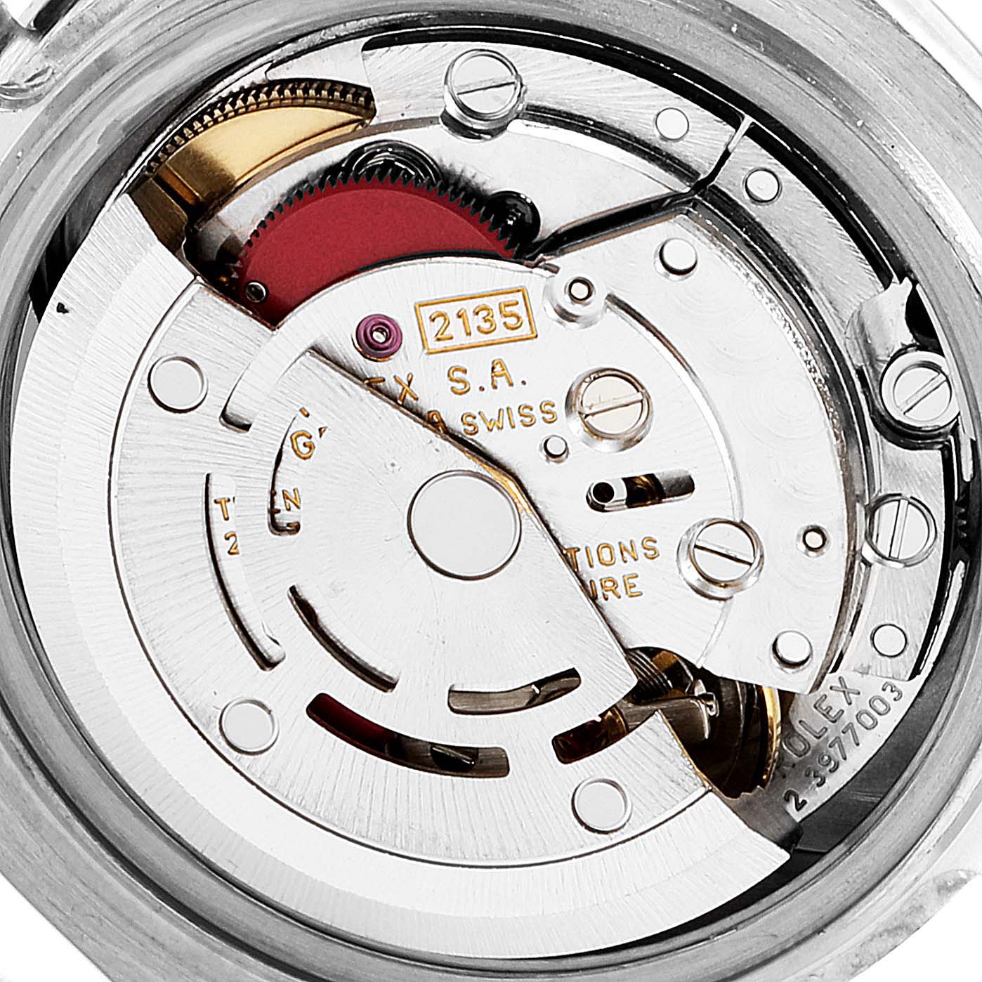 The image shows a close-up of the inner mechanical movement of a Rolex Pearlmaster 69319 Women's White Gold Silver Dial 69319 Women's White Gold Silver Dial watch.