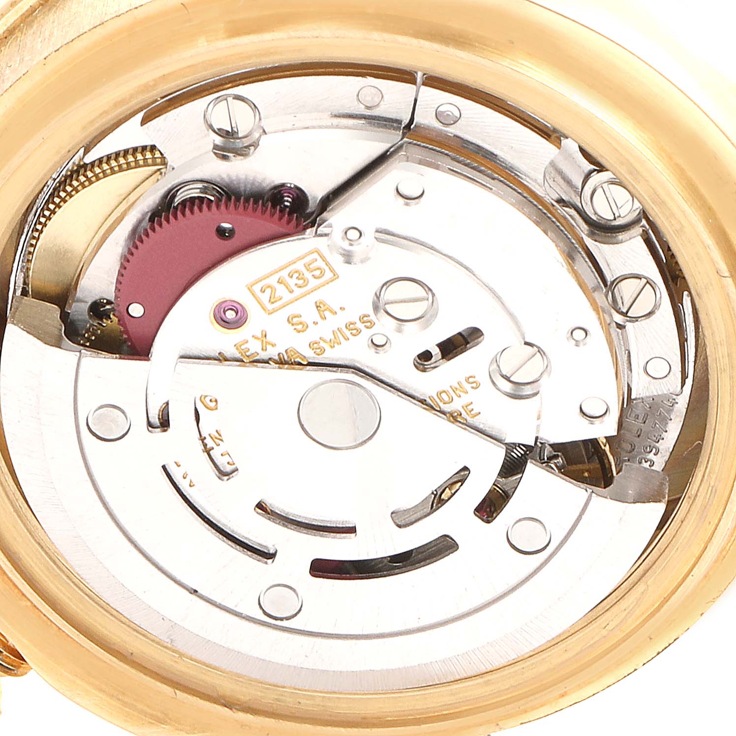 This image shows the internal mechanism of the Rolex Pearlmaster 69318 Women's Yellow Gold White Dial 69318 Women's Yellow Gold White Dial watch, focusing on its movement components, gears, and markings.