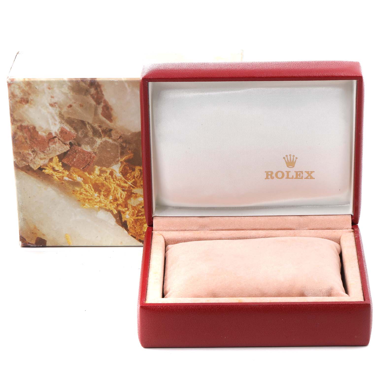 This image shows an open Rolex watch box for the President model, displaying the interior cushion and logo.