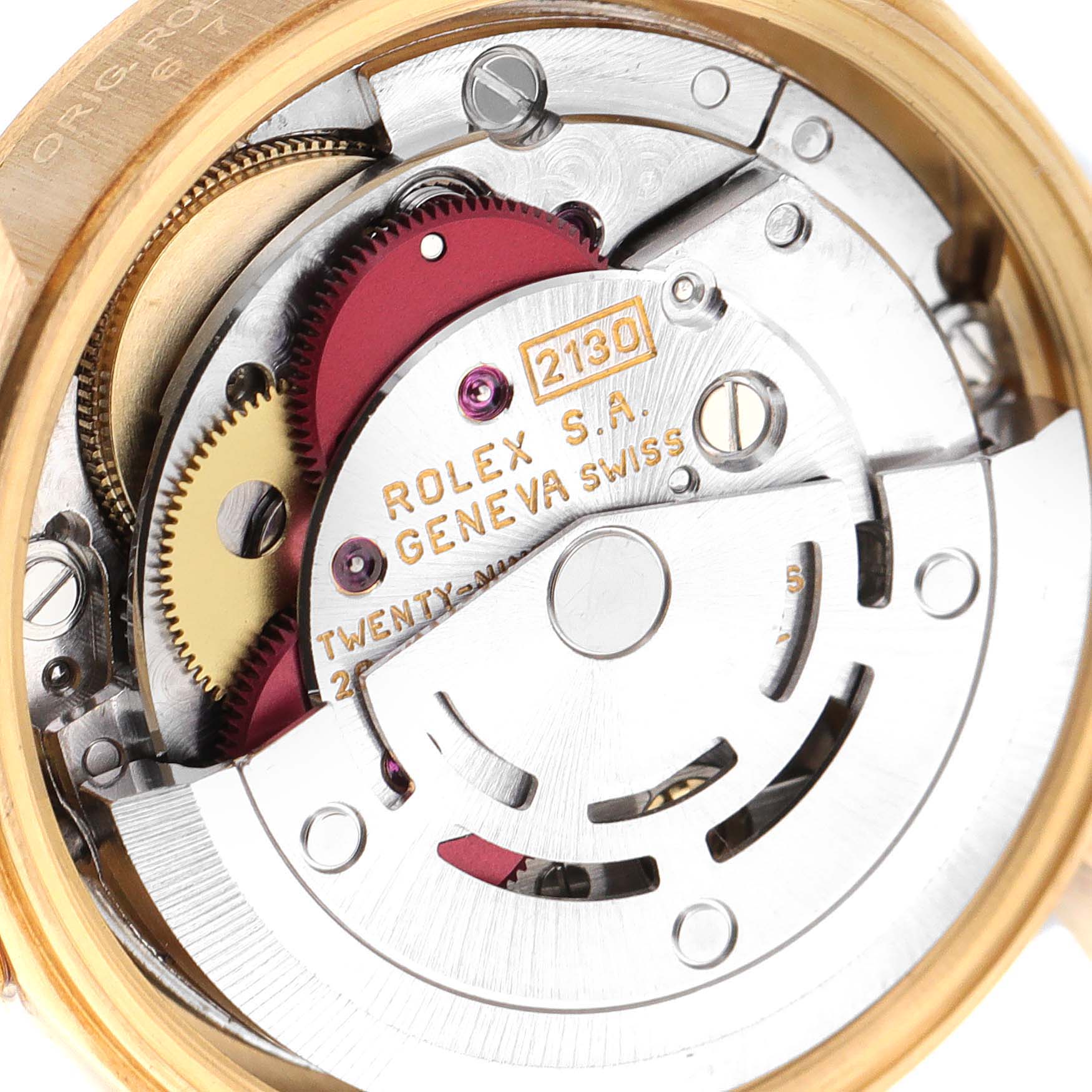 The image shows the inner mechanical movement of a Rolex President 67198 Women
s Yellow Gold Champagne Dial 67198 Women
s Yellow Gold Champagne Dial model watch, highlighting the gears and rotor.