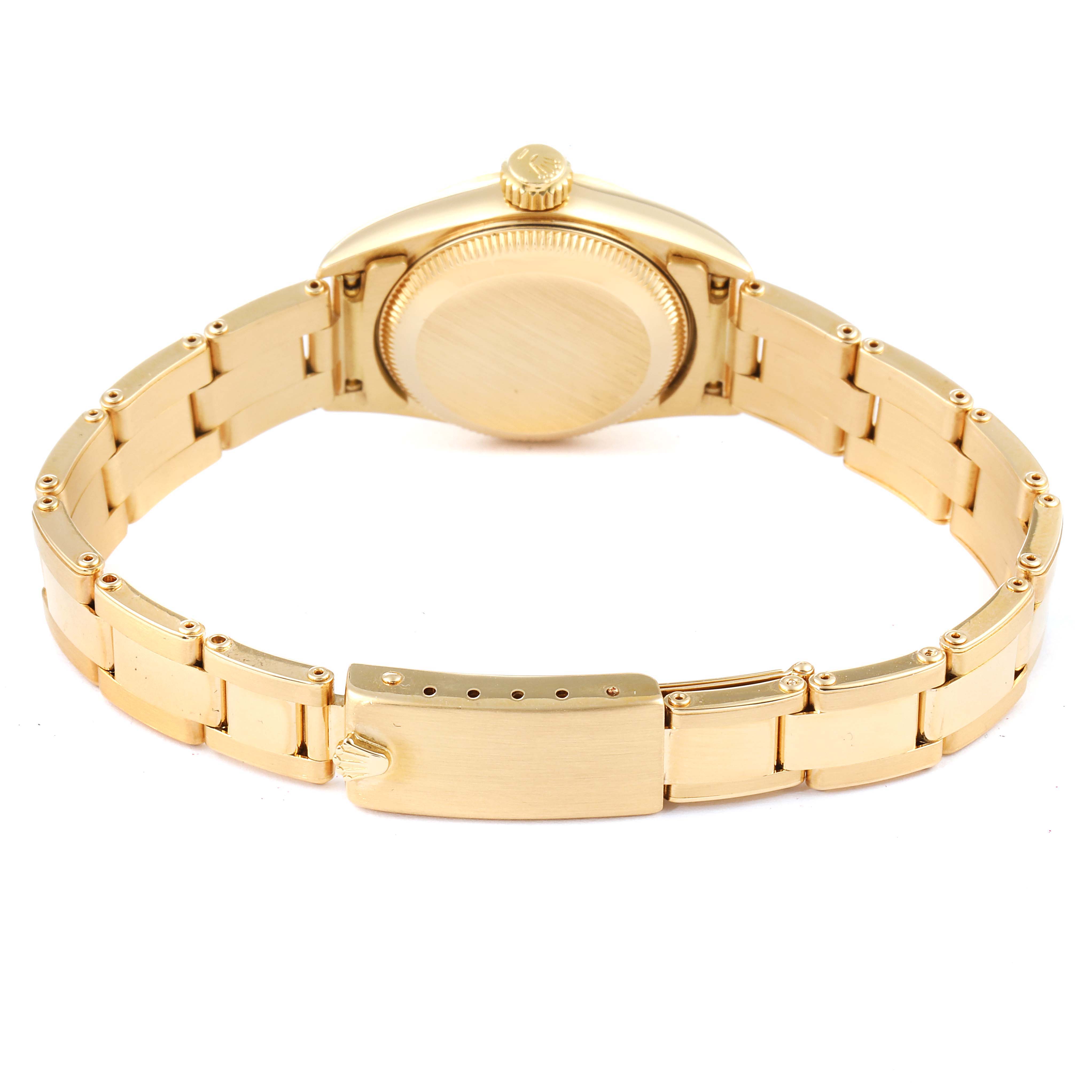 The image shows the back, crown, and bracelet of a Rolex President 67198 Women
s Yellow Gold Champagne Dial 67198 Women
s Yellow Gold Champagne Dial model watch.