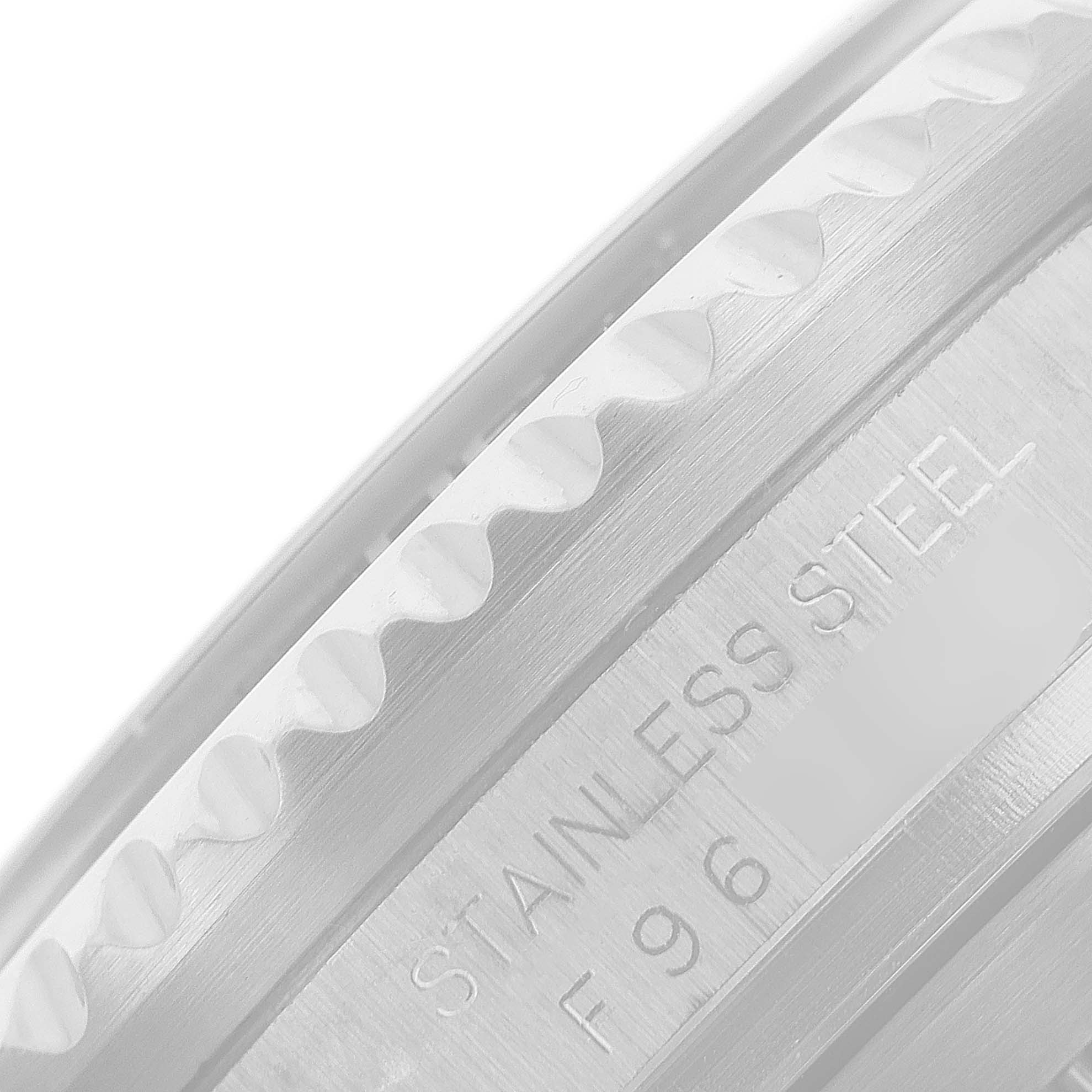 The image shows a close-up of the side case and bezel edge of a Rolex Sea-Dweller 16600 Men
s Stainless Steel Black Dial 16600 Men
s Stainless Steel Black Dial watch.