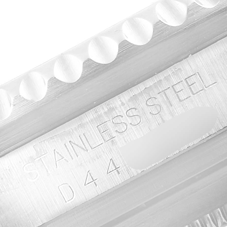 The image shows a close-up of the bezel and side markings on a stainless steel case of a Rolex Sea-Dweller 16600 Men
s Stainless Steel Black Dial 16600 Men
s Stainless Steel Black Dial watch.