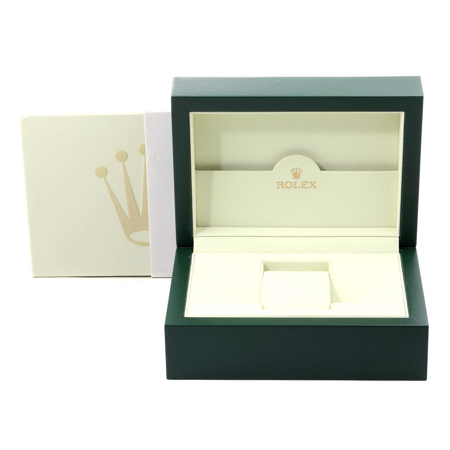 The image shows an open Rolex Sea-Dweller 16600 Men
s Stainless Steel Black Dial 16600 Men
s Stainless Steel Black Dial watch box with its lid open and an insert for holding the watch.