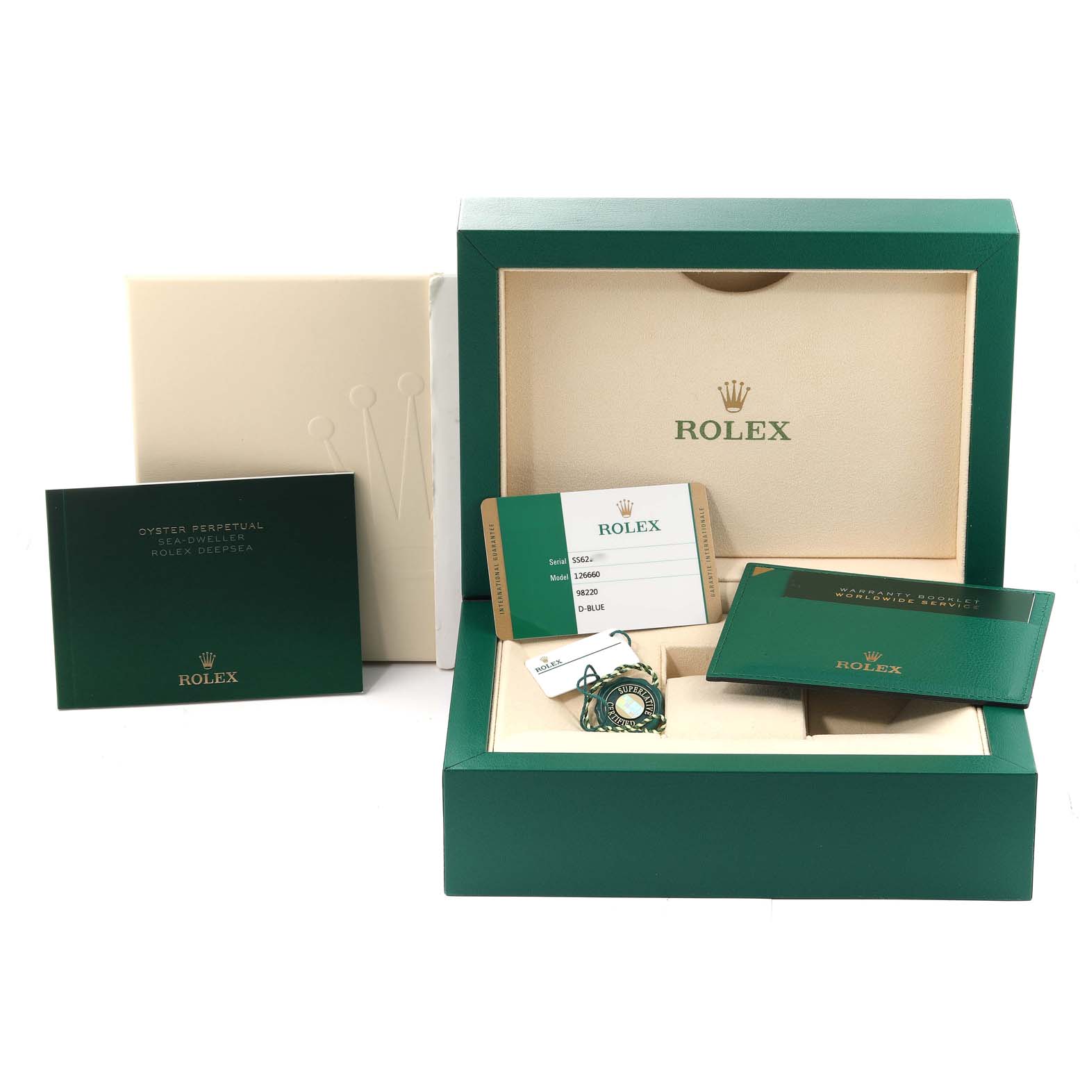 The image shows the packaging, manuals, warranty card, and tags for a Rolex Sea-Dweller 126660 Men's Stainless Steel Blue Dial 126660 Men's Stainless Steel Blue Dial model watch, with the watch box open.